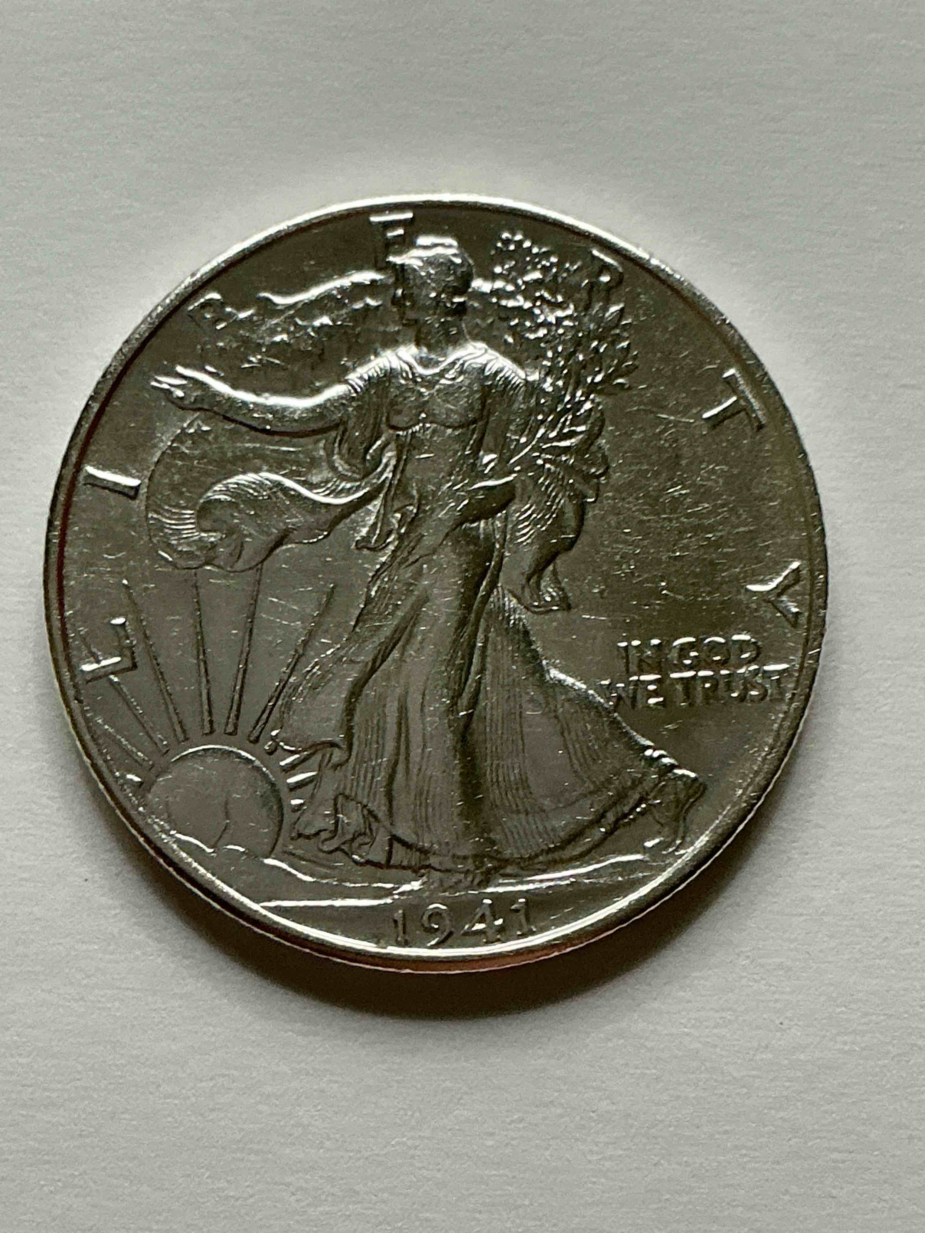 World War II Silver! Antique U.S. Silver! Liberty Walking Silver Fine U.S. Silver Half Dollar! This Striking Half Dollars Were Minted From 1916-1947 & Have Become Some Of The Most Collectible Coins In History! Here Is A Striking Circulated Example From 1941! Appears Uncirculated! Liberty Walking Coins Are 90% Fine U.S. Silver, A Great Investment In Precious Metal!