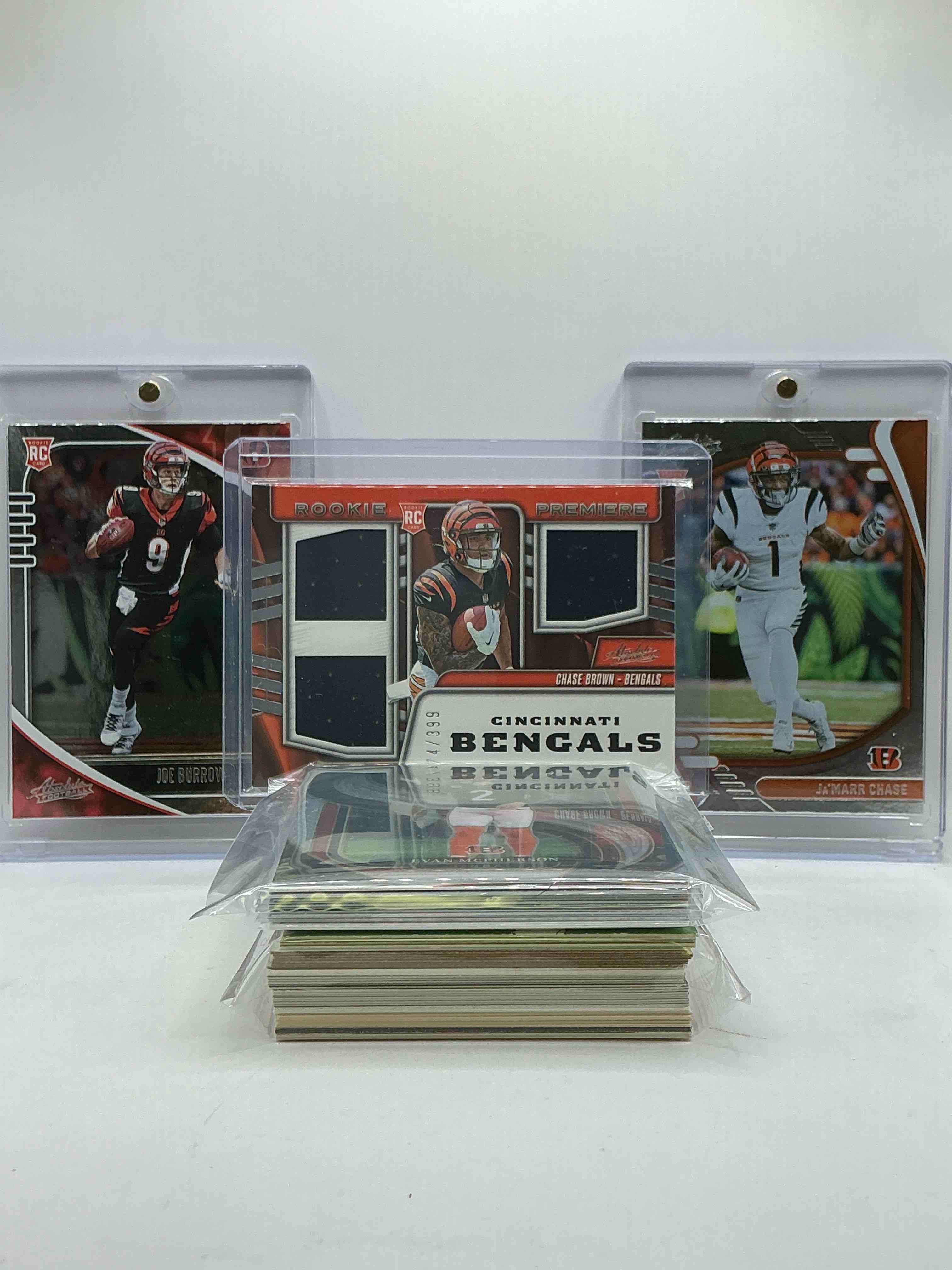 Absolute Bengals Combo! Insane Rookie Card Trio! Chase Brown Triple Patch Rookie /399 Card, Joe Burrow Rookie, Ja’marr Chase Rookie & More! Insane 50 Card Bengals Lot! WOW! Rookies Legends & More!