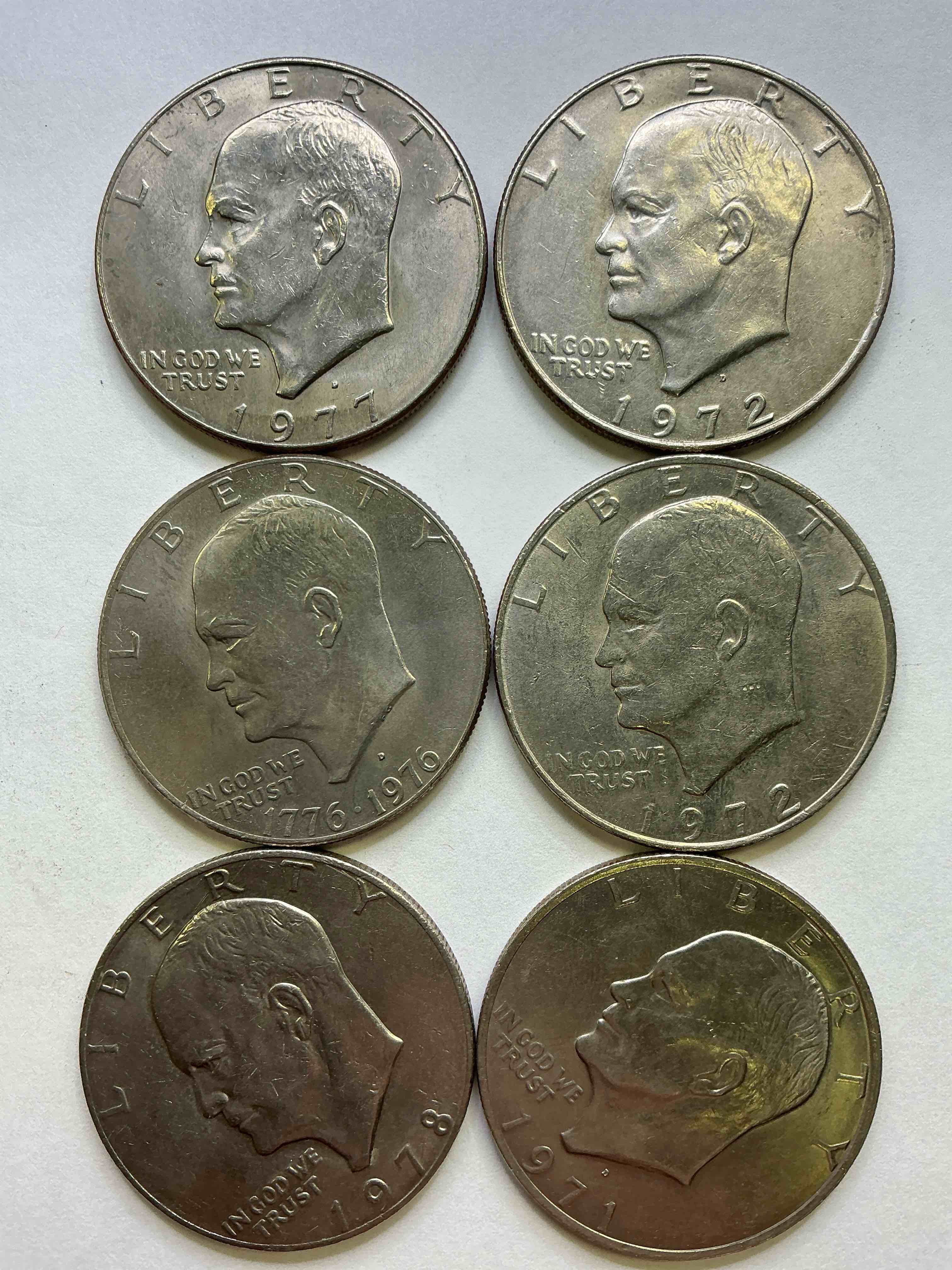 brilliant eisenhower dollar coins! these striking, large u.s. coins were minted from 1971-1978. here are gorgeous examples of “ike" dollars from 1976 & more! these coins have become immensely popular with collectors & some have great toning!