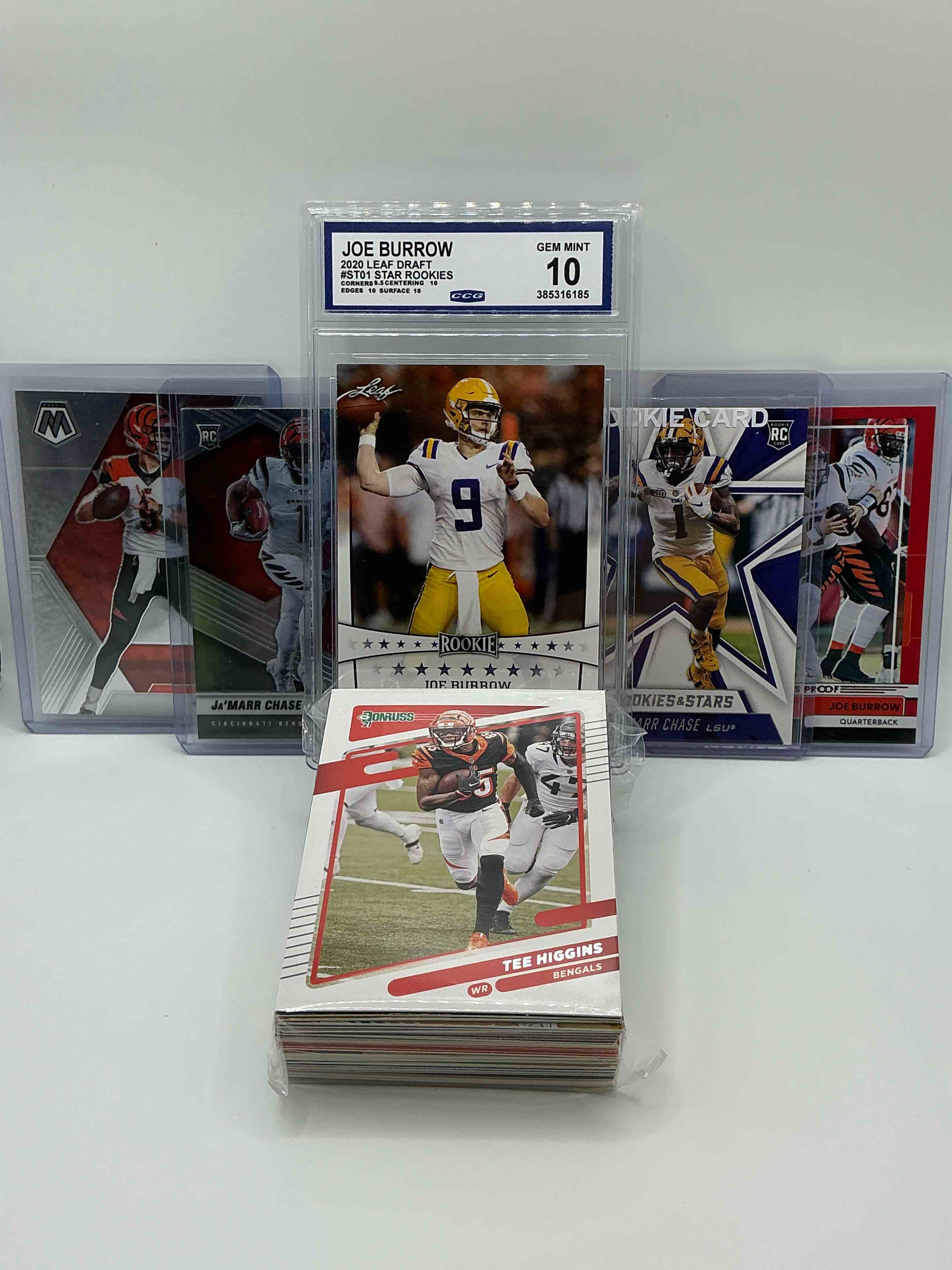 Rookie Rambunctiousness! Super Rare Gem Mint 10 Joe Burrow Rookie, Mosaic Silver Rookies Ja'marr Chase & Joe Burrow Rookies Along With A Ja'marr Chase "Rookies And Stars" 2021 Panini Rookie Card & A 2021 "Press Proof" Red Joe Burrow! 50 Card Craziness, Commons, Rare Cards & More!