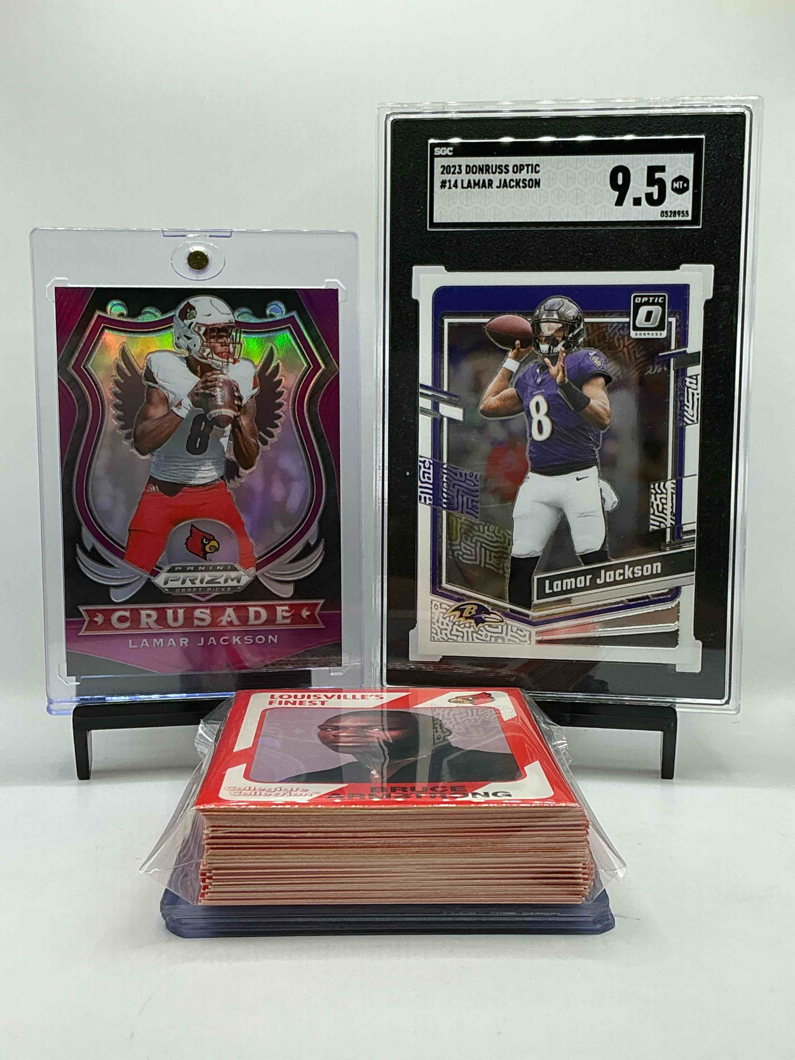 Lamar Jackson Bonanza! Cardinal Craziness! Lamar Jackson Optic 9.5 Card, Pink & Silver Crusade Card, Along With Other UofL Legends Like Devante Parker, Teddy Bridgewater & More! 50 Card Lot, With Commons, Heroes & More!