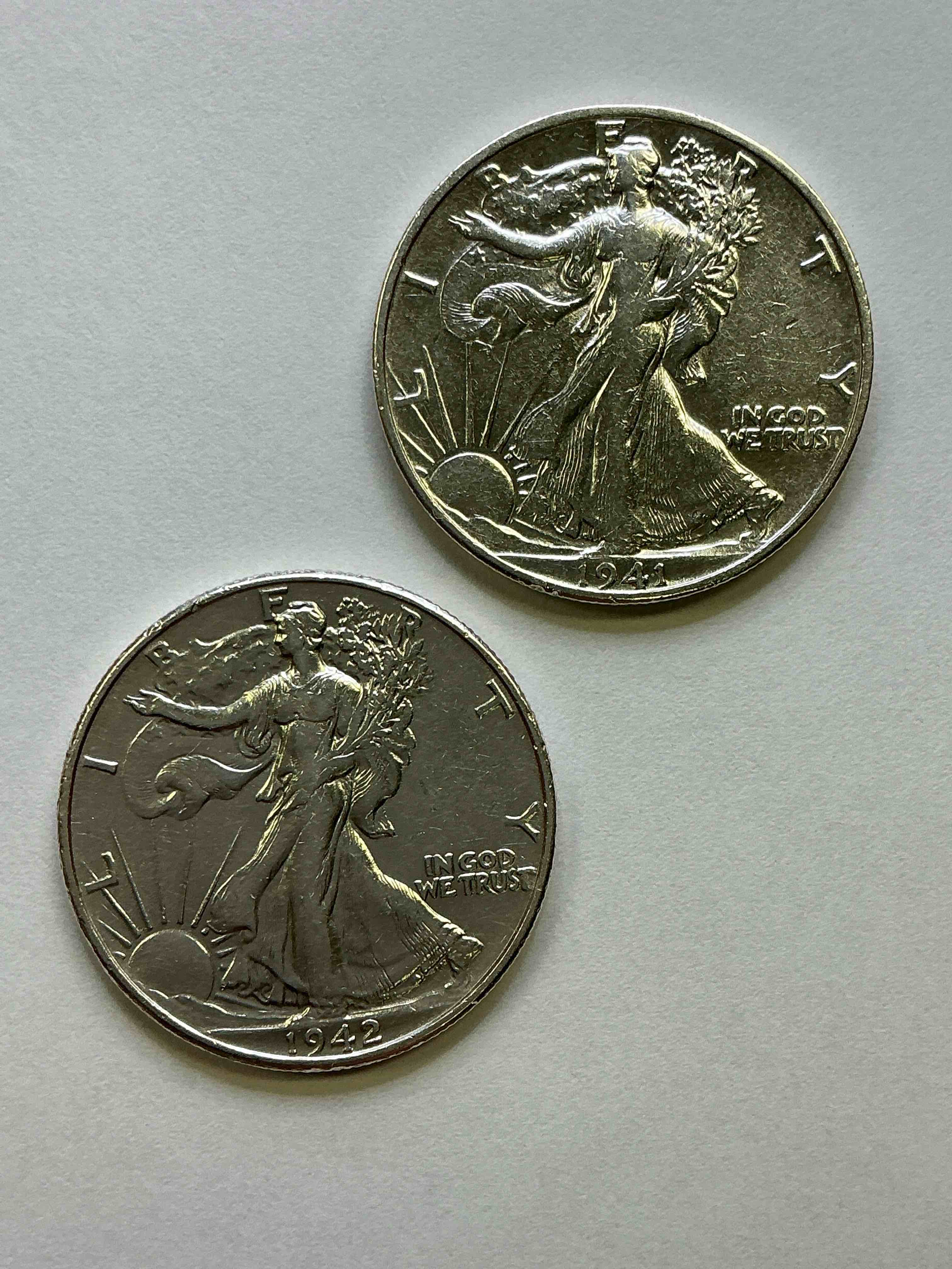 World War II Era Silver! Antique U.S. Silver! Liberty Walking Silver Half Dollars! These Striking Half Dollars Were Minted From 1916-1947 & Have Become Some Of The Most Collectible Coins In History! Here Is A Striking Circulated Examples, From 1941 & 1942, Liberty Walking Coins Are 90% Fine U.S. Silver, A Great Investment In Precious Metal!