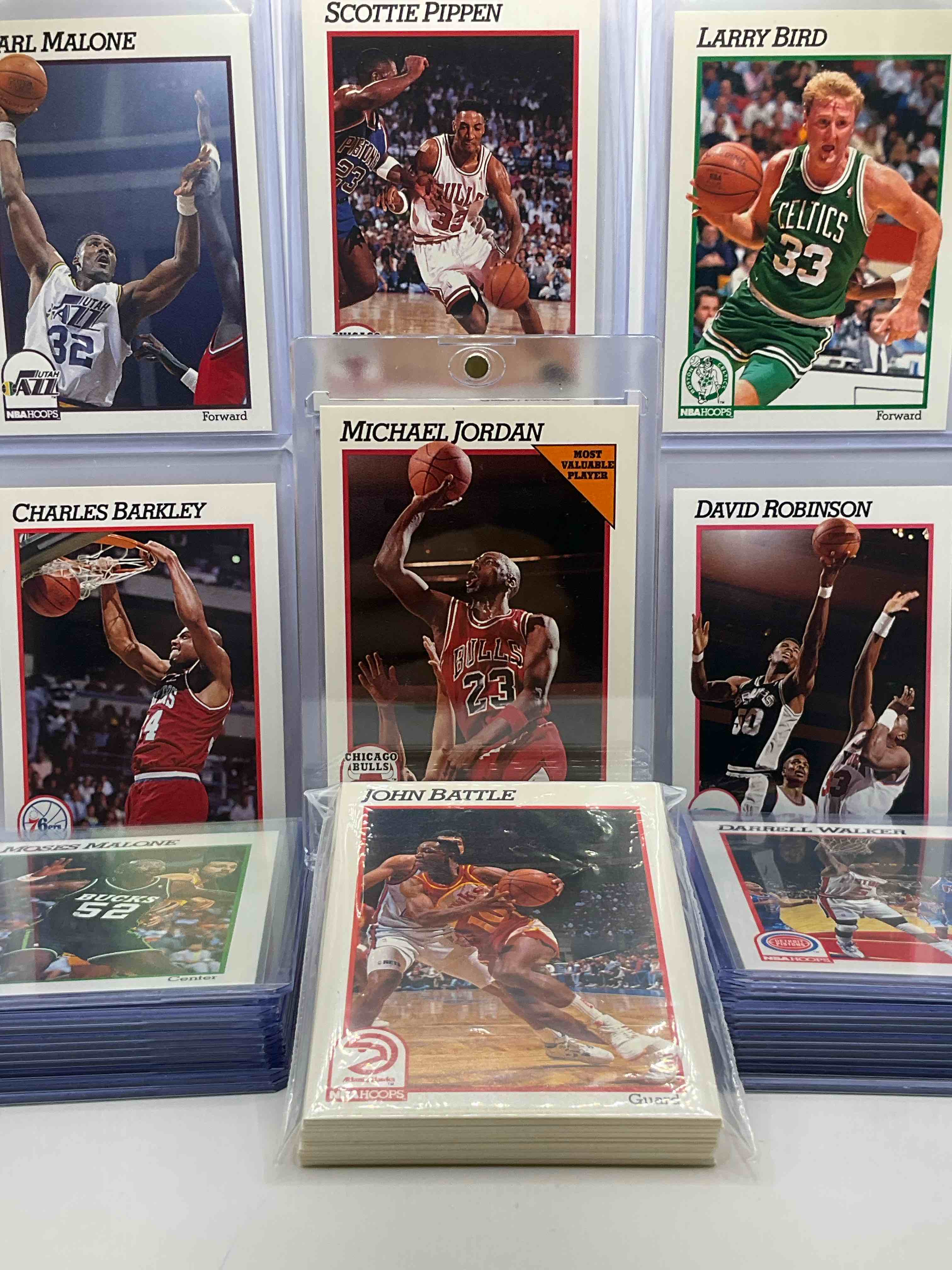 1991/92 nba hoops michael jordan & more! holy grail basketball! 1991/92 nba hoops basketball cards! 50 card craziness! one of the most coveted michael jordan, larry bird, scottie pippen, charles barkley, karl malone, akeem olajuwon & clyde drexler cards! along with other nice 1991 nba basketball cards! wilkins & more! these cards are super rare, only 5 years off from a jordan rookie! awesome base cards combo! wow! mixed with a variety of other cards, doesn't get better than this!