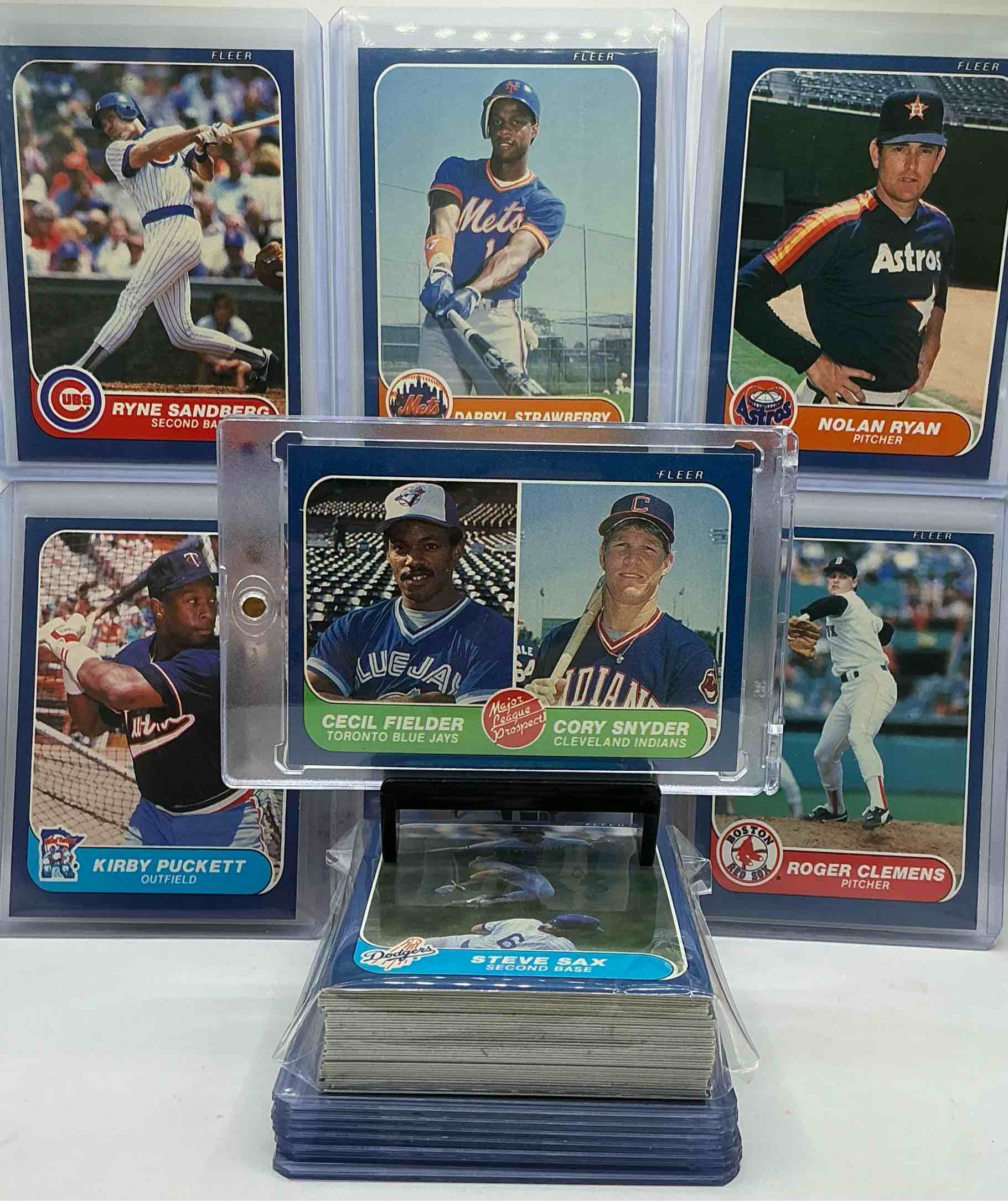 1986 Fleer Baseball 50 Card Craziness! The Biggest Names In Baseball From The Decade! Pete Rose, Nolan Ryan, Roger Clemens, Don Mattingly, Darryl Strawberry, Wade Boggs, Ryne Sandberg, Cal Ripken, Rickey Henderson & More! These Cards Are Getting More & More Rare By The Day, Don't Miss This Opportunity To Have These Rare 1986 Baseball Cards Filled With Baseball Legends!
