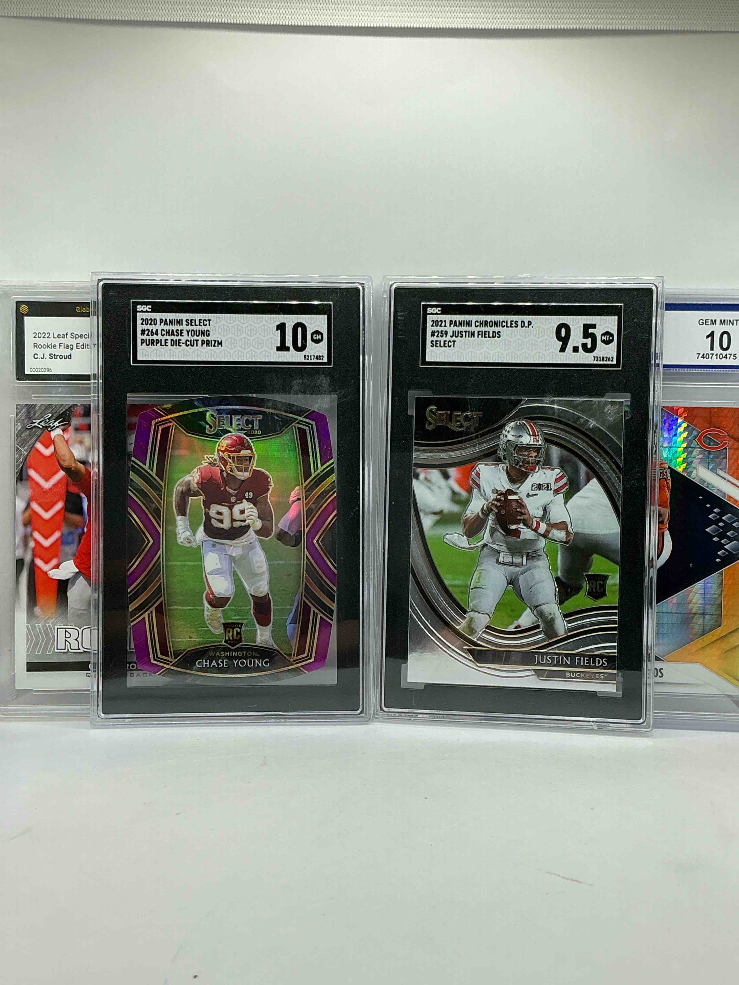 Columbus Craziness! Ohio State Rookie Legends… Three Gem Mint 10 & One 9.5! Whoa! CJ Stroud Rookie, Justin Fields Phoenix Rookie, Chase Young Pink Diecut Rookie & Justin Fields Select Rookie! WOW!