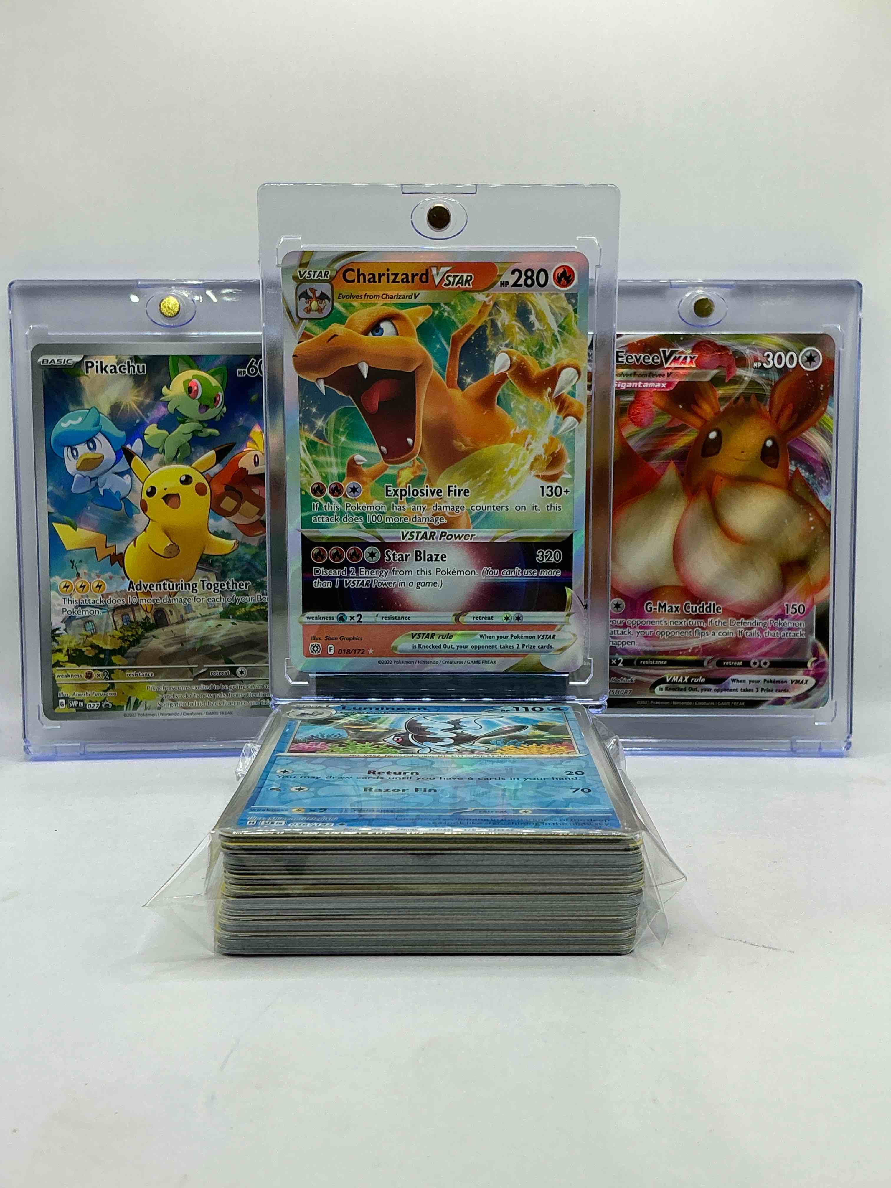 Pikachu Colorful Holo, Charizard VSTAR RARE HOLO & Eevee VMAX Holo! WOW! Insane Trio… Also Paired With Other Awesome Cards! This 50 Card Lot Includes Commons, Holos, Legends, Heroes & More!