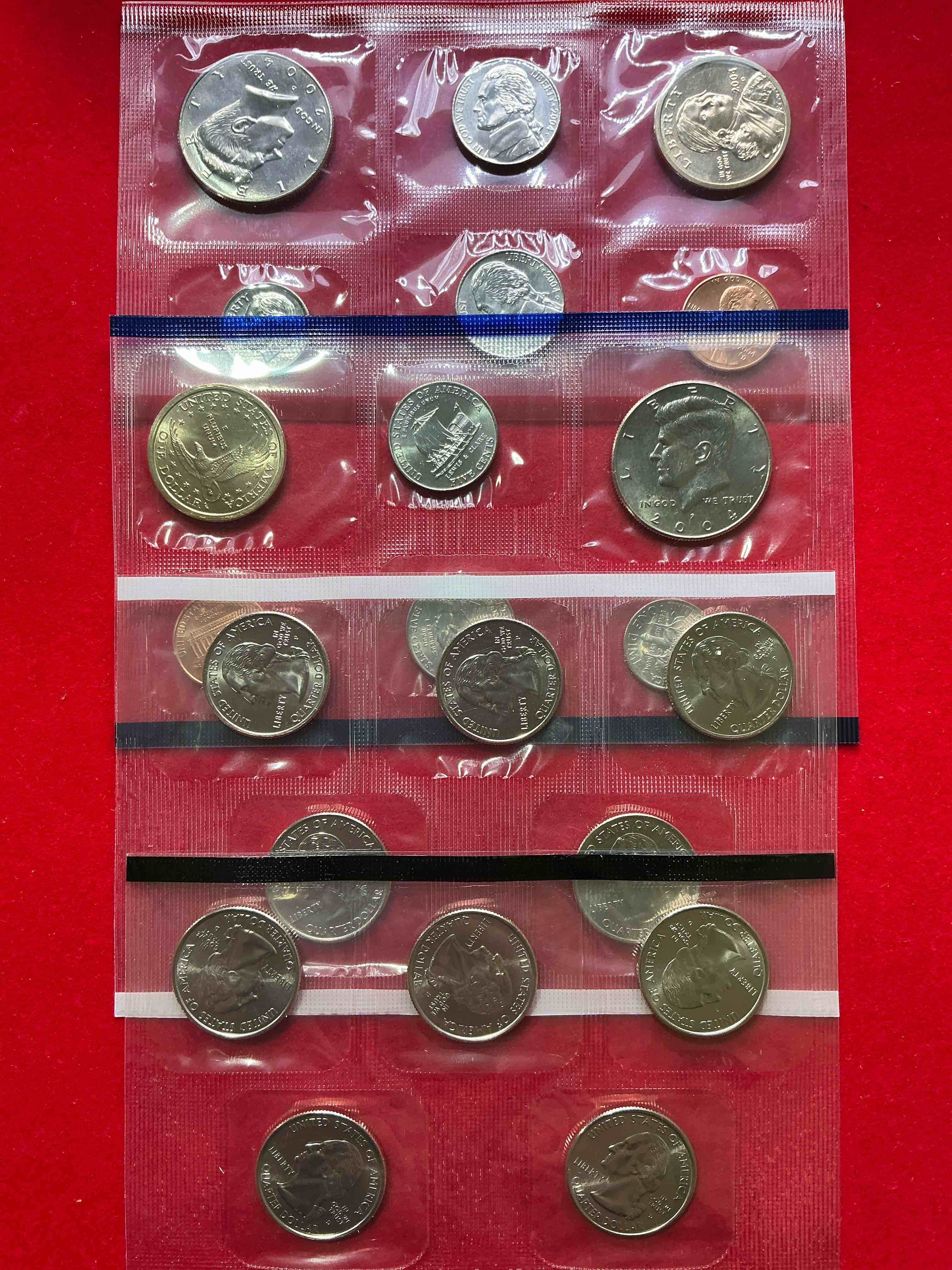 2004 Uncirculated Mint Set! 20 Coin Mint Set With State Quarters! Half Dollars, One Dollar Coins, Quarters, Nickels, Dimes & Pennies! 20 Coin Uncirculated Mint Set!
