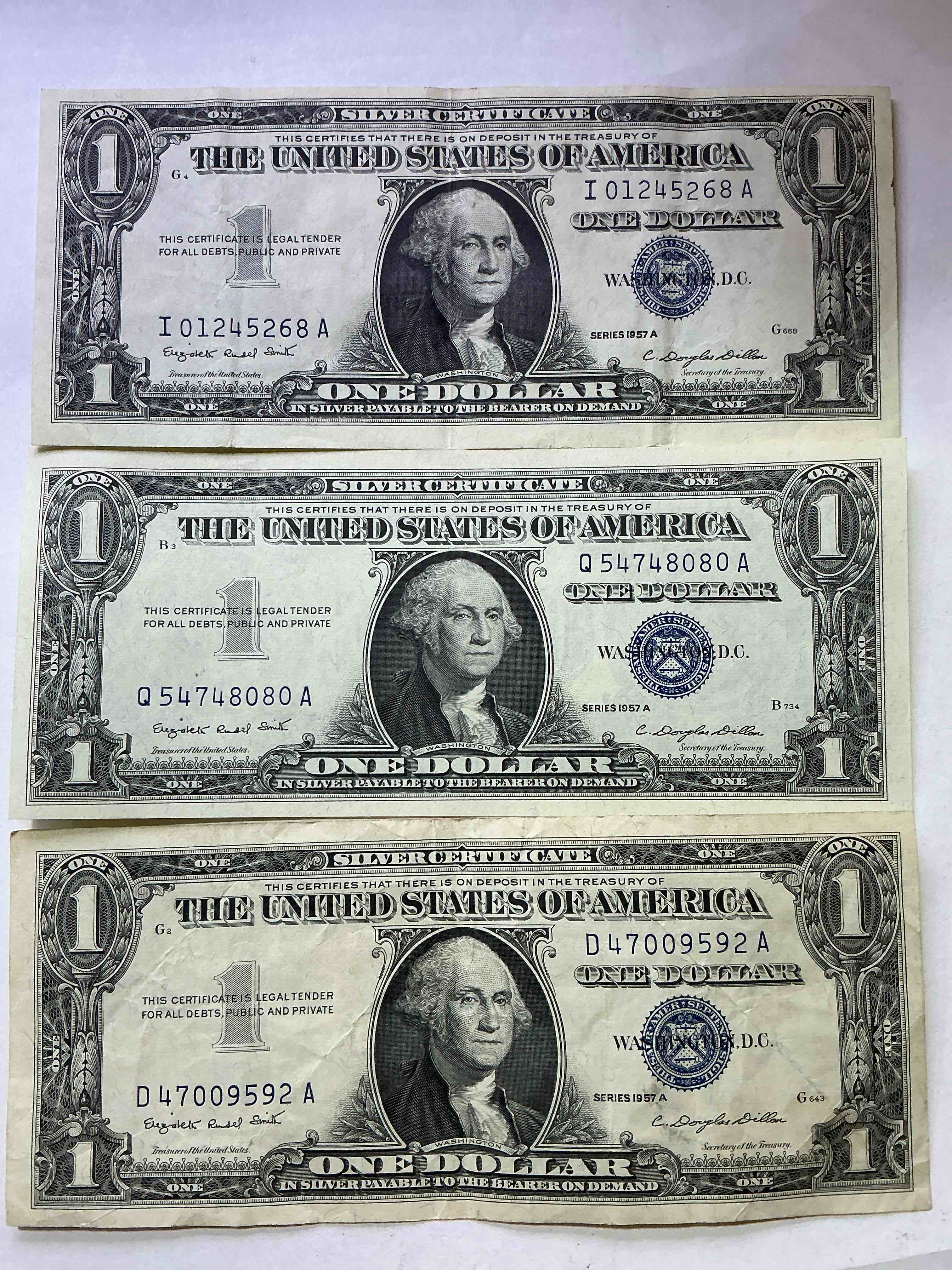 1957 Series Silver Certificates! Did You Know That Prior To 1964 One Dollar U.S. Paper Money Was Actually Redeemable For Silver Dollars?! Wow How Times Have Changed! Silver Certificates Were Produced From 1878 To 1964 & Are Still Considered Legal Tender At Face Value. Here Are Gorgeous, Circulated 1957 U.S. One Dollar Silver Certificate, With Highly Collectible "Blue Seal!* Own An Awesome Piece Of History!
