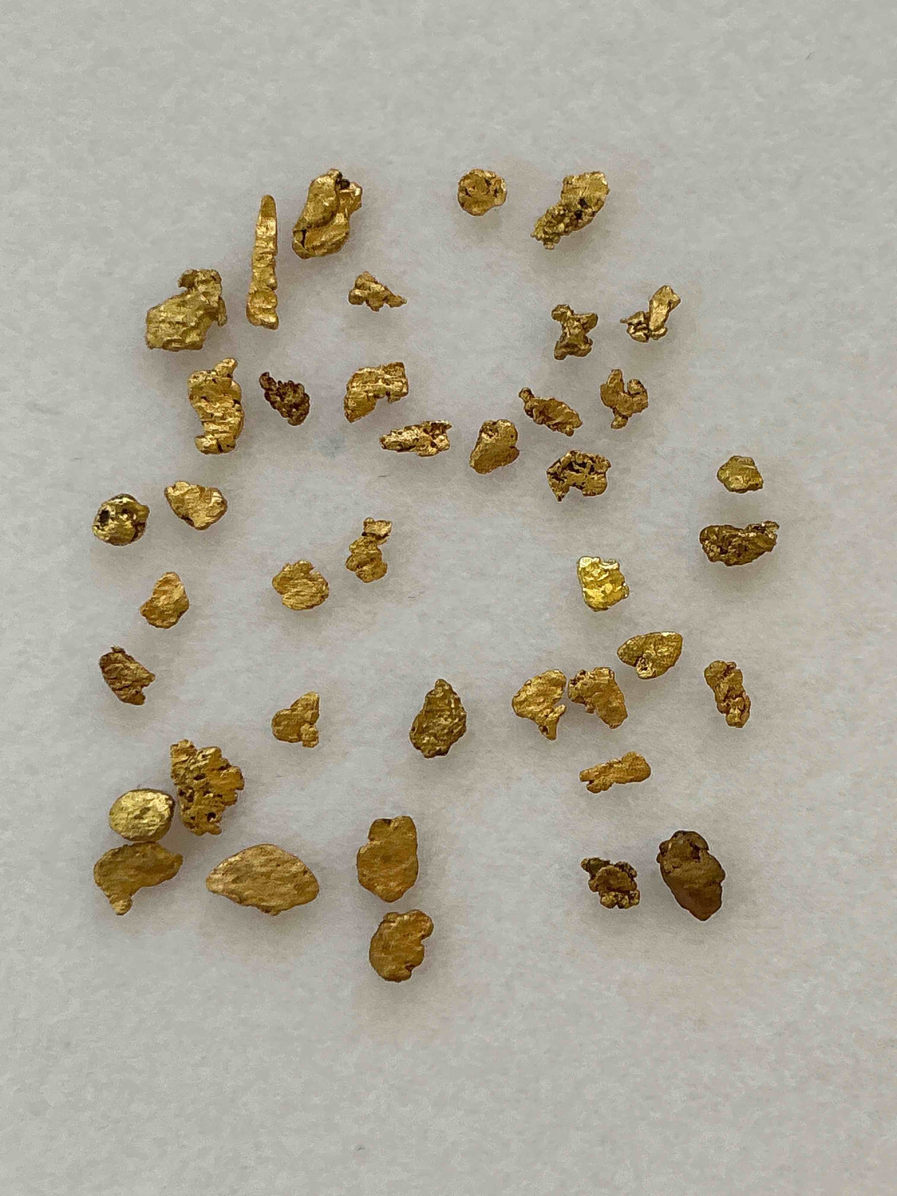 Genuine Gold Nuggets! Gold Nuggets Fresh From Prospecting North Carolina Mountains, Total Weight Of All Nuggets Is Approximately .5 Grams. These Gold Nuggets Typically Test At Between Approx 22-24 Karat. Gold In Raw, Prospected Form Is Extremely Hard To Find & Much Rarer Than Any Refined Form. Get In On The Gold Craze... Gold Has Increased In Value Over 40% In 2025 Alone! U.S. Dime For Size Reference Only (not included). Gold Vile In Image Included. Own Genuine, Gold Nuggets! 