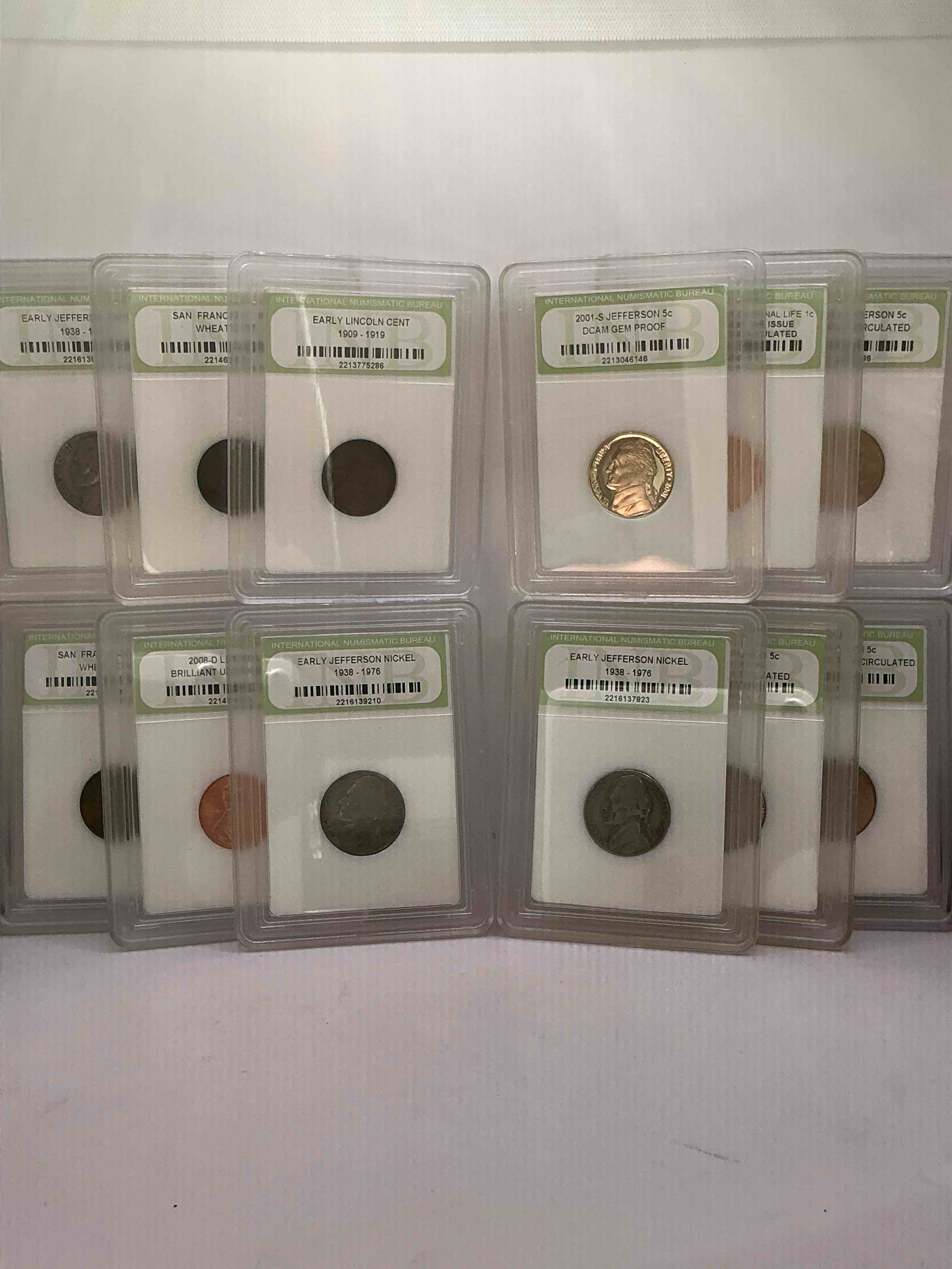 Collector's Dream! 12 Different Rare, Slabbed U.S. Collector Coins In Certified/Catalogued Protective Slab Cases! A Great Way to Build An Incredible Collection Of Protected, Rare U.S. Coins! Great For The Coin Fan & Collector!