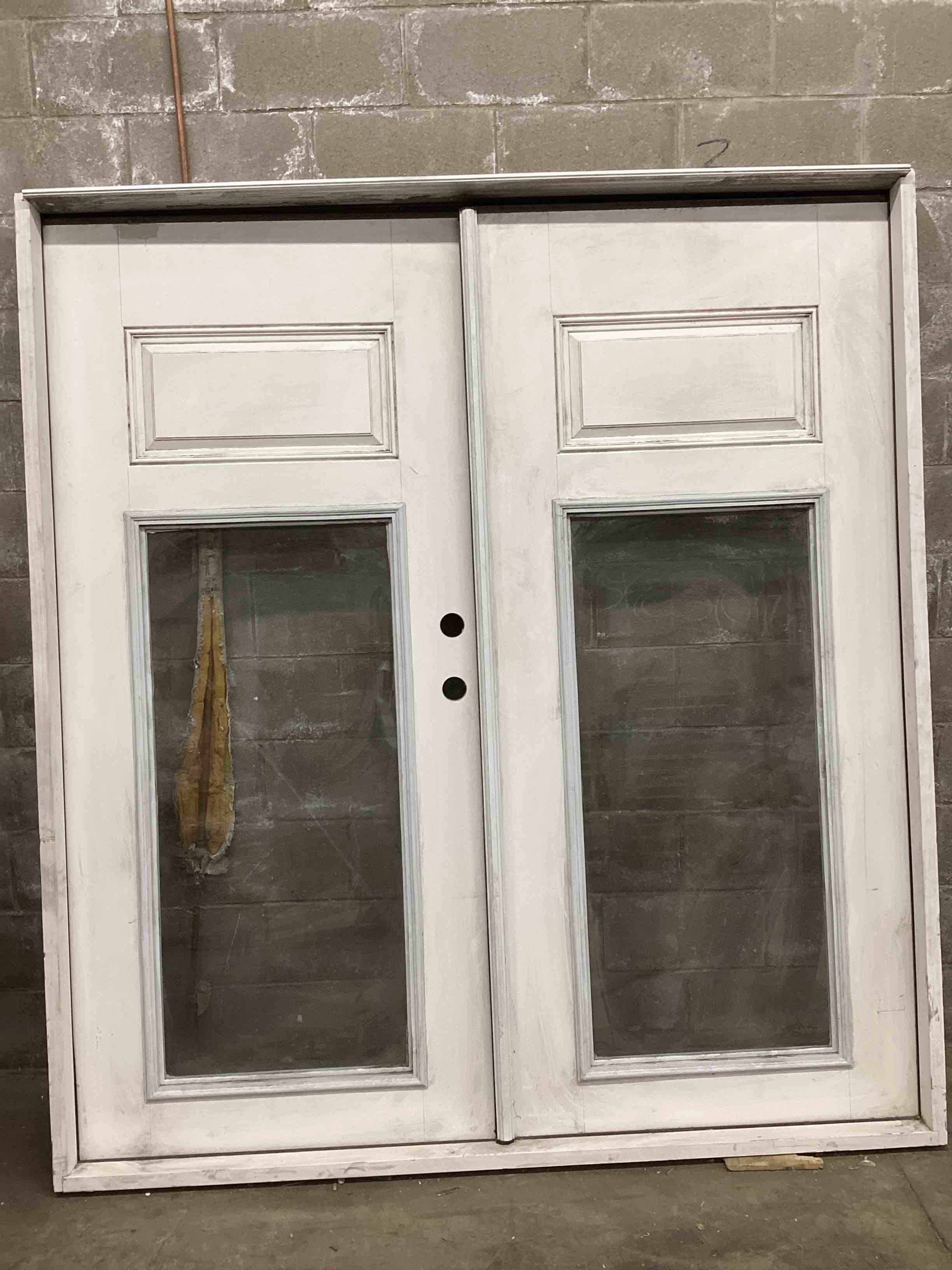 Double panel exterior door sized “72 x 79”
