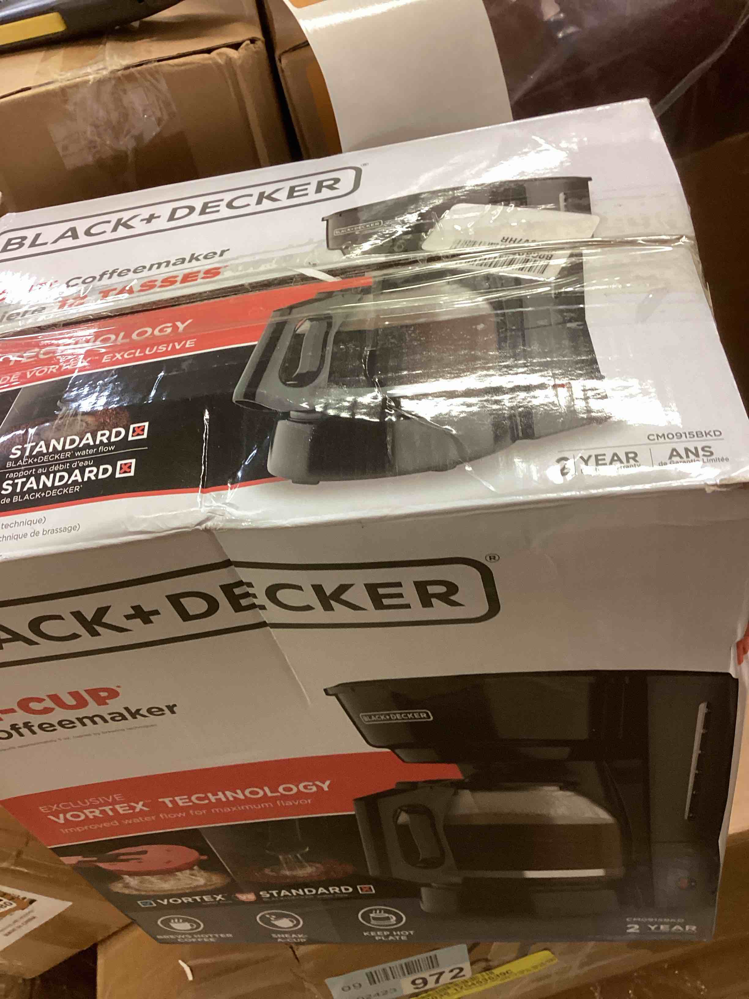 Condition photo showing As Is for black+decker 12-cup coffee maker with easy on/off switch, easy pour, non-drip carafe with removable filter basket, vortex technology, black 12-cup 12-cup