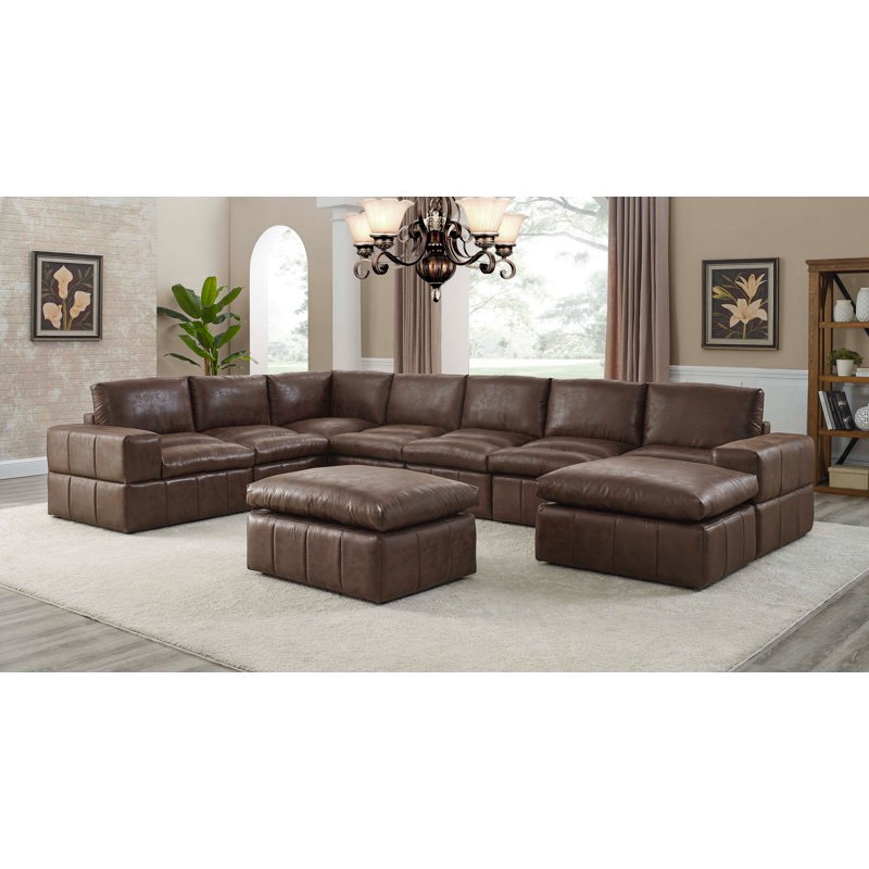 9 - Piece Upholstered Sectional brown (only onottoman)