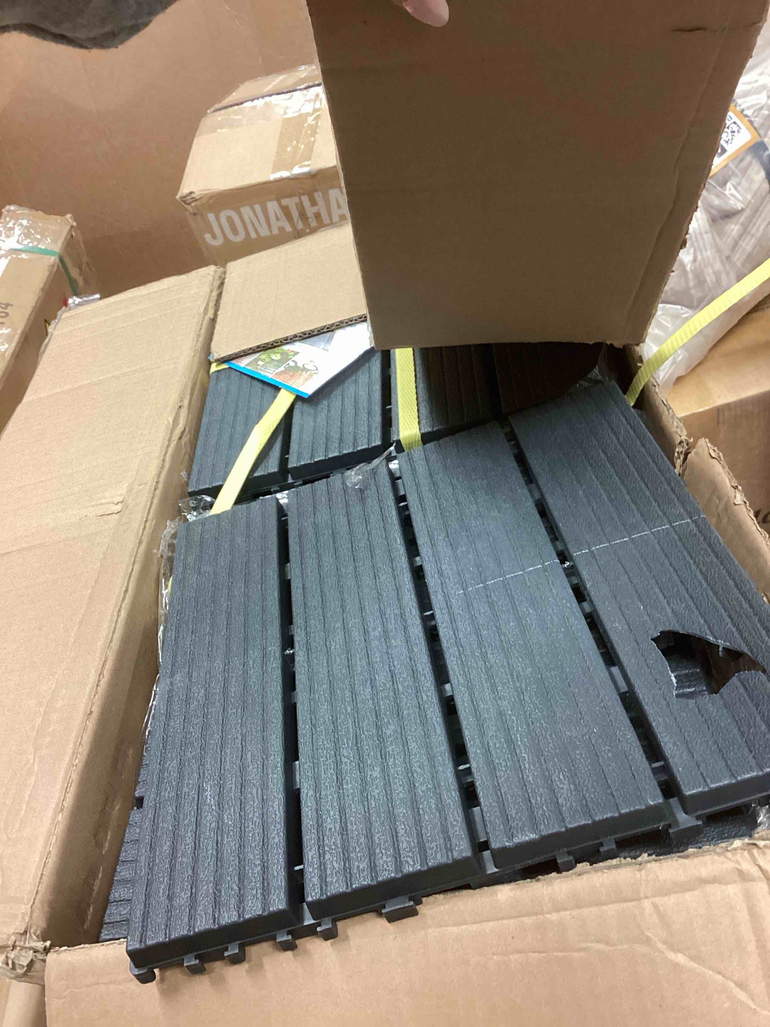 Condition photo showing Good Condition for (only damage 1 tile) 1 ft. x 1 ft. All-Weather Plastic Square Interlocking Patio Deck Tiles, Outdoor Striped Pattern Flooring Tile(44-Pack)