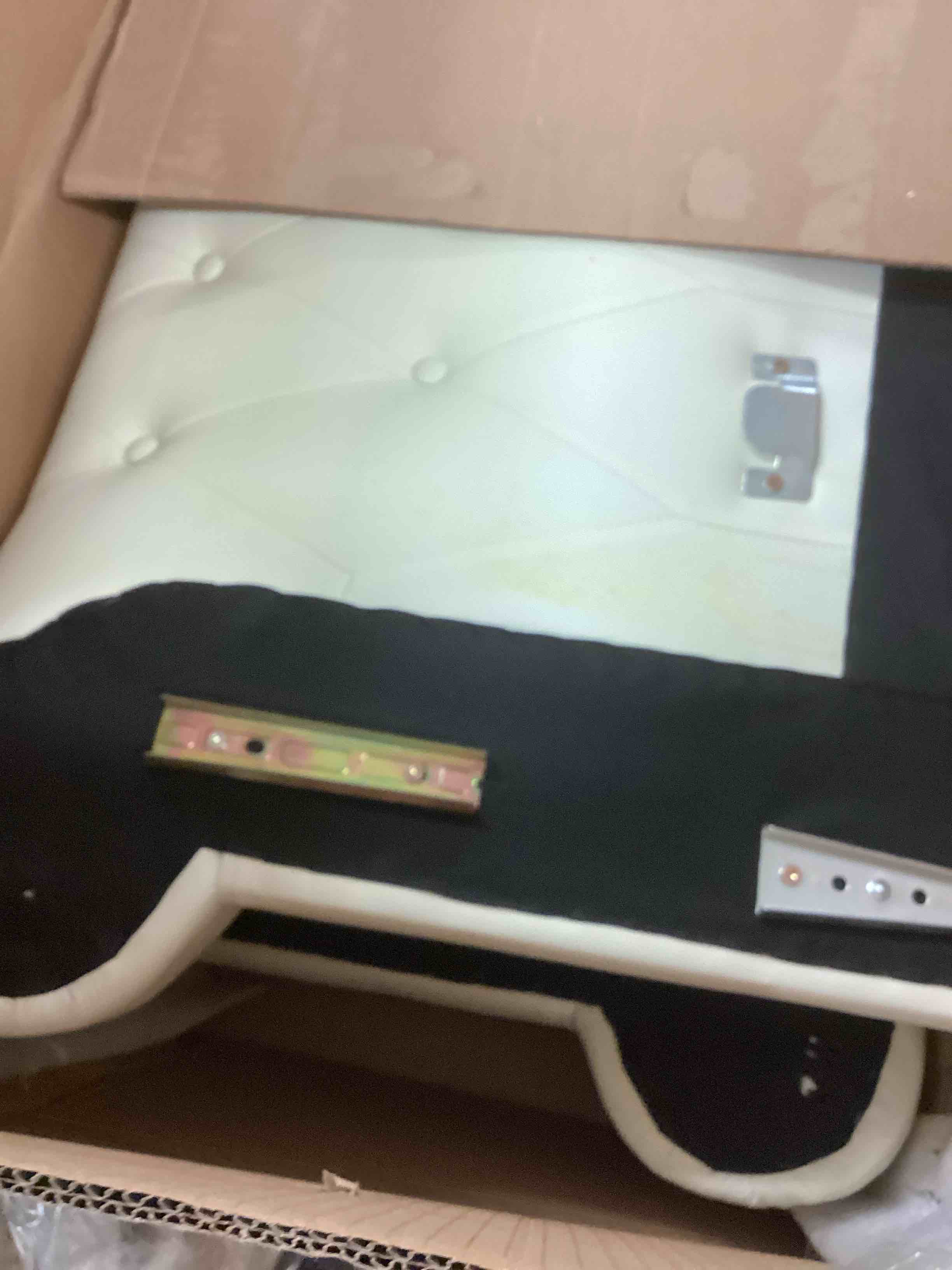 Condition photo showing As Is for faux leather loveseat sofa with rolled armrest,beige (incomplete one box of two only)