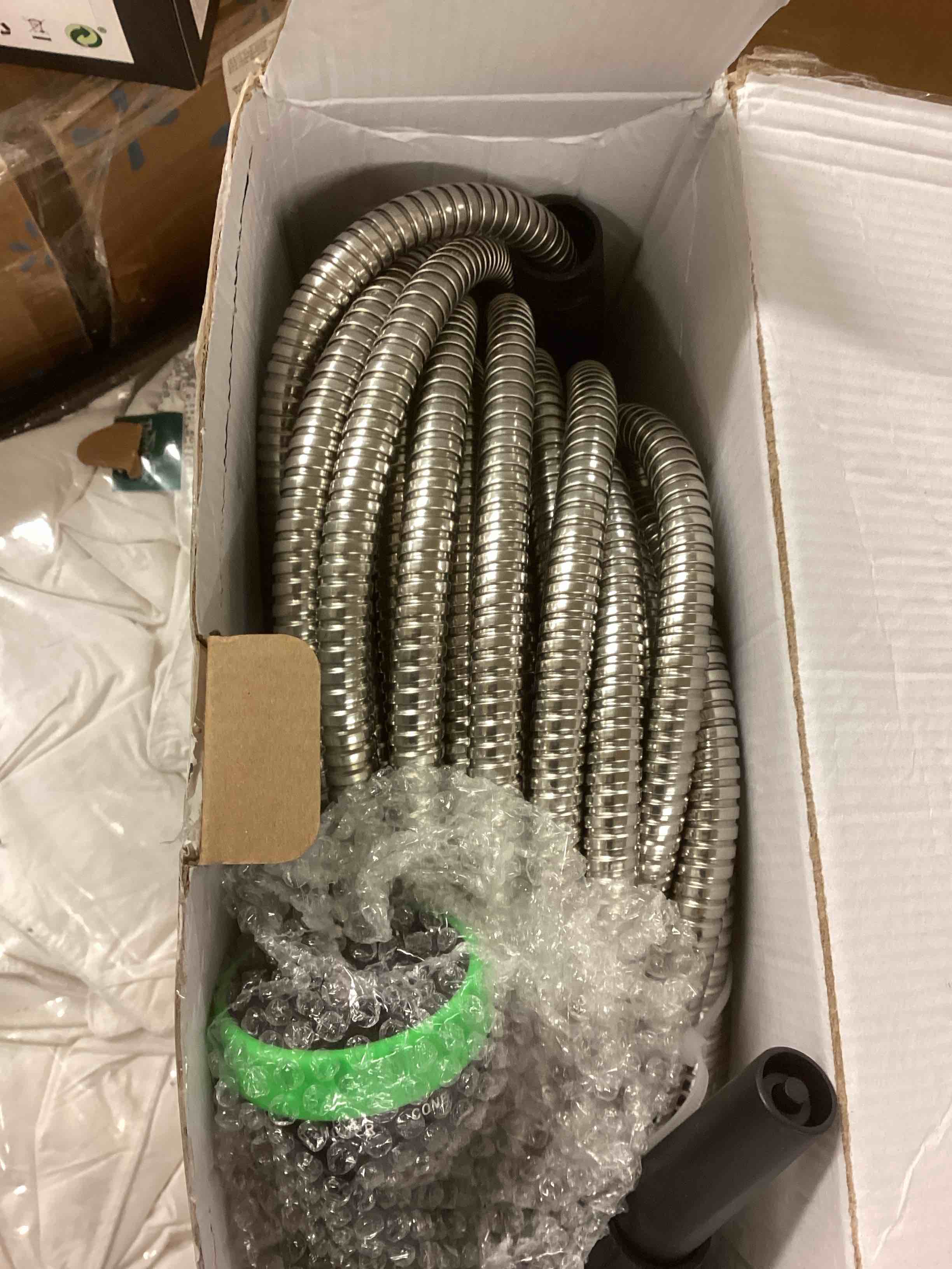 Condition photo showing New/Like New for stainless steel garden hose 100ft