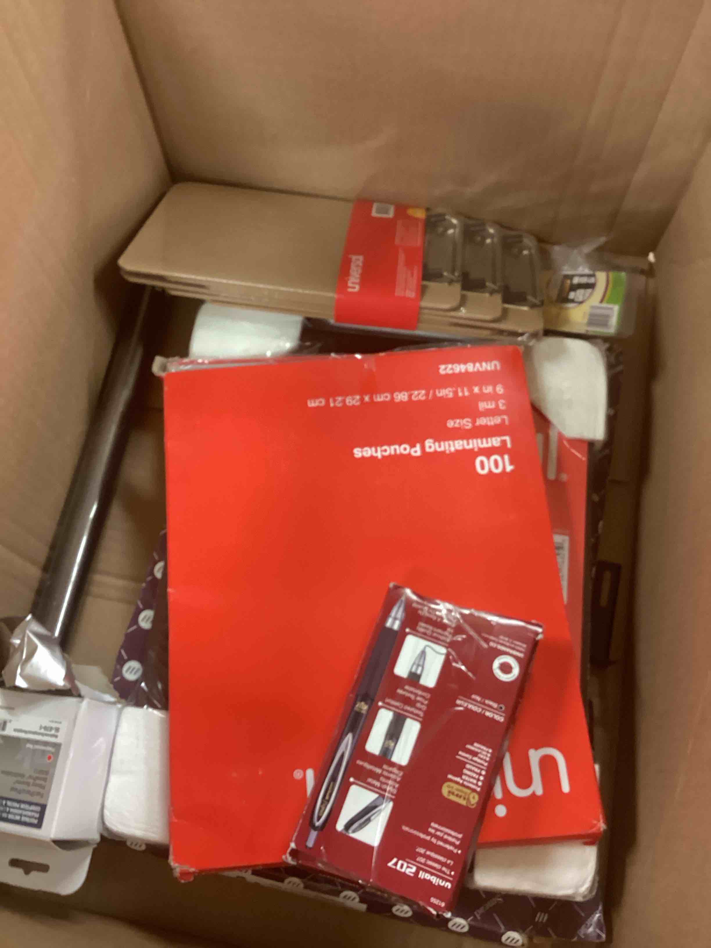 box of assorted office products 