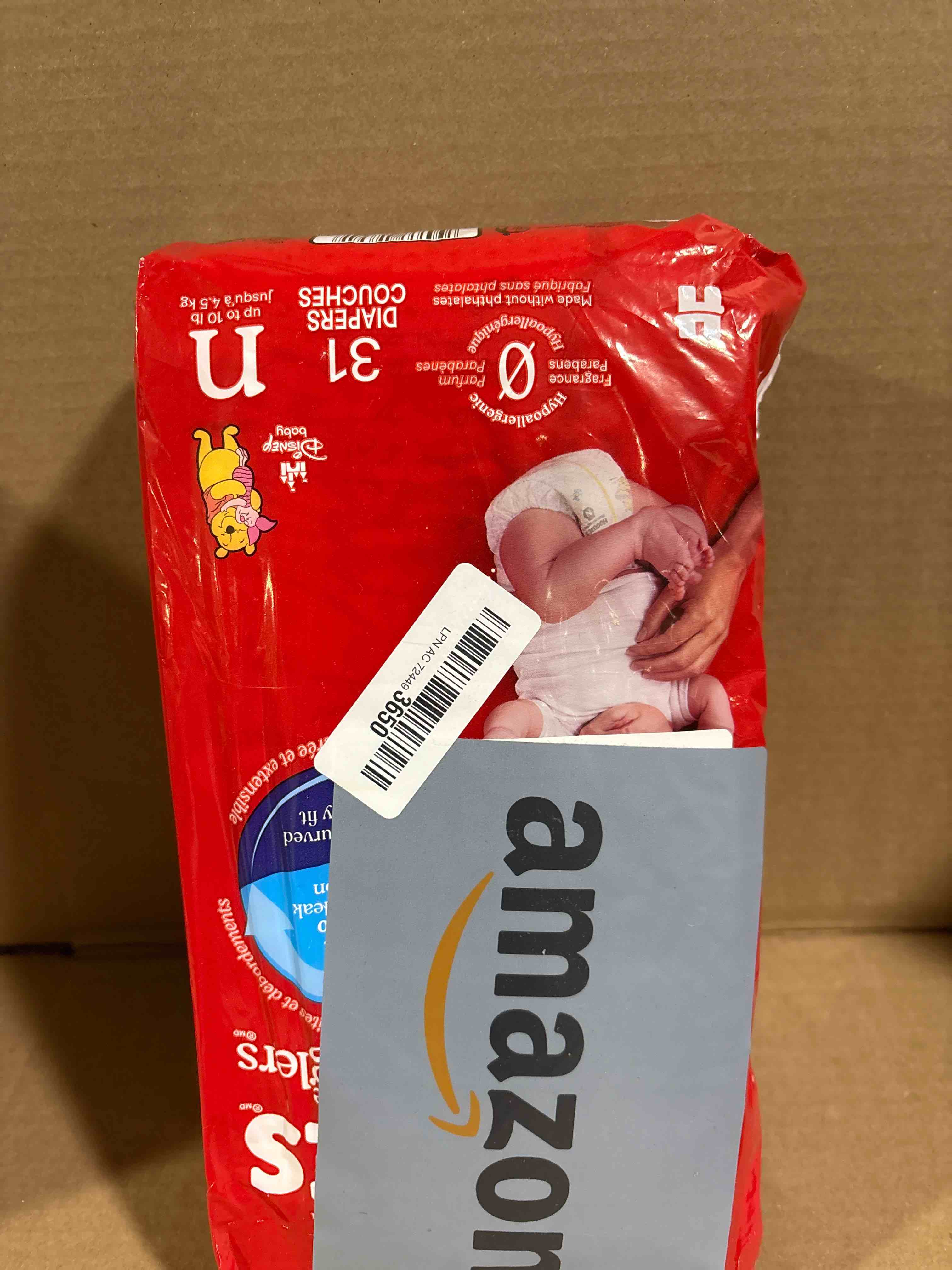 Condition photo showing New/Like New for Huggies Size Newborn Diapers, Little Snugglers Baby Diapers, Size Newborn (up to 10 lbs), 31 Count, Packaging May Vary Newborn 31