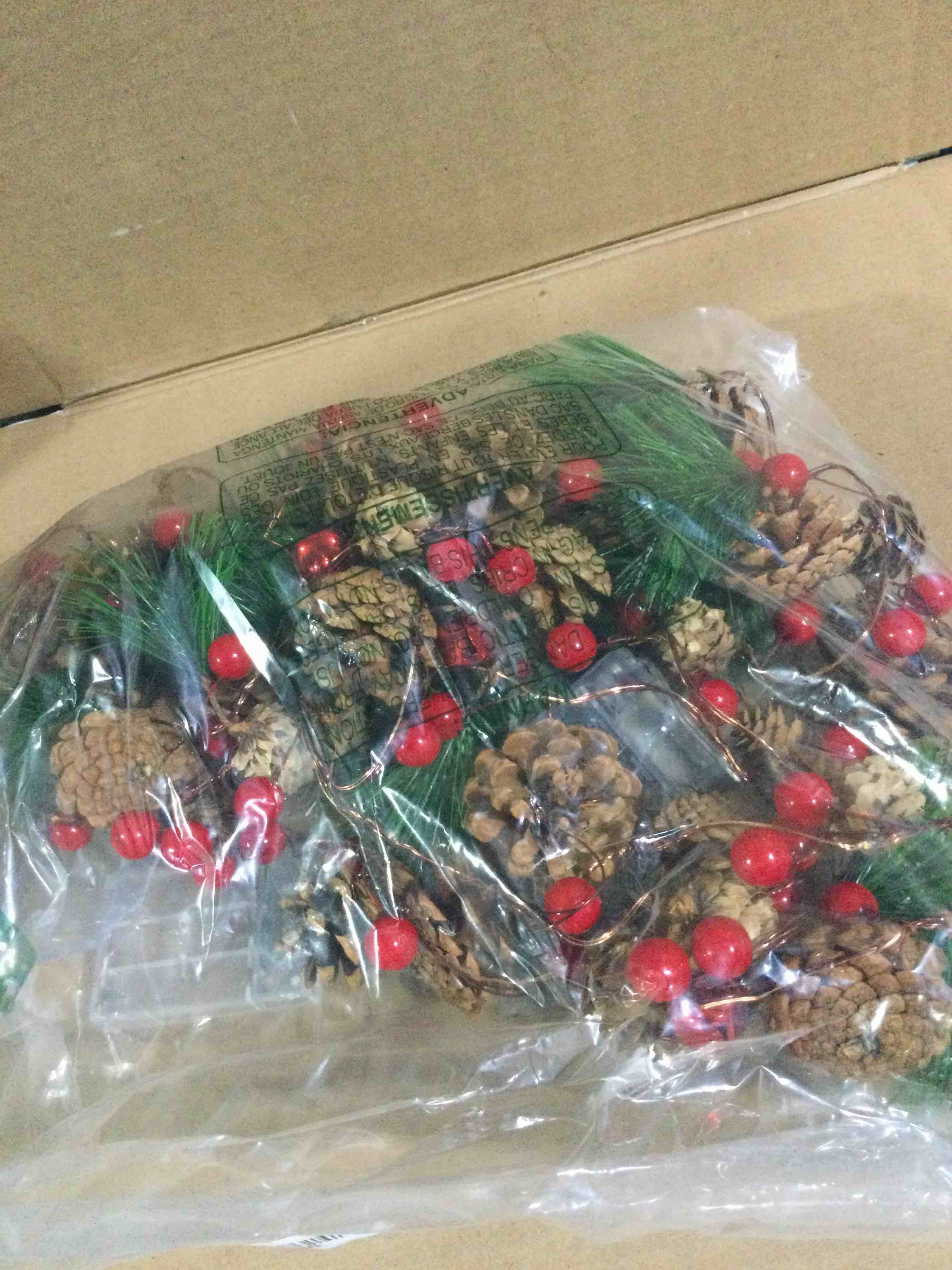Condition photo showing As Is for 2 Pack Artificial Christmas Garland with Lights - Battery Operated 6.56FT Prelit Garland with 20 LED lights, Red Berries, Pine Cones, Pine Needles Decor for Xmas Tree Thanksgiving Home Fireplace Party 2 Pack Pine Cone Garland
