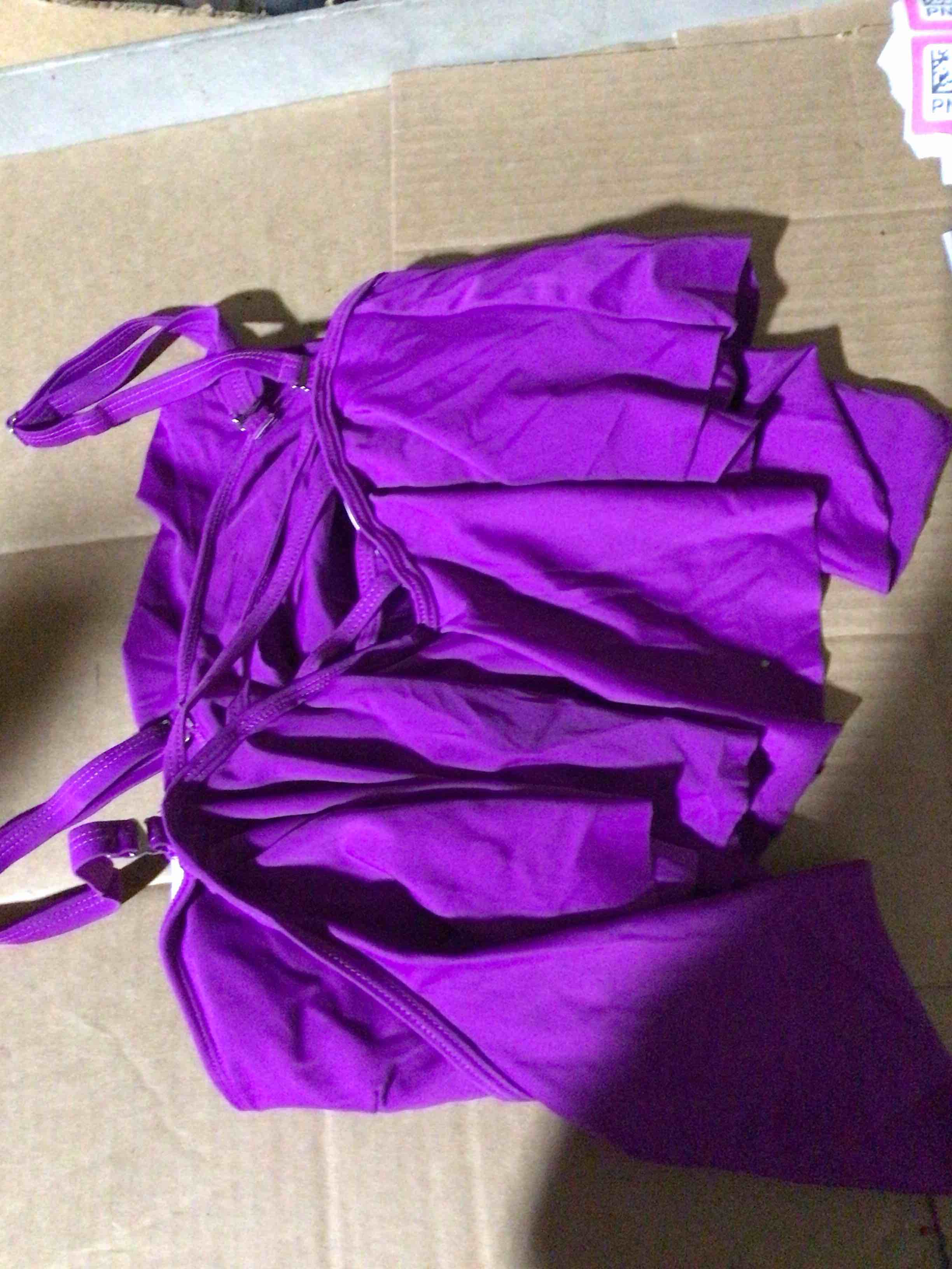Swimsuit top with purple straps size L.