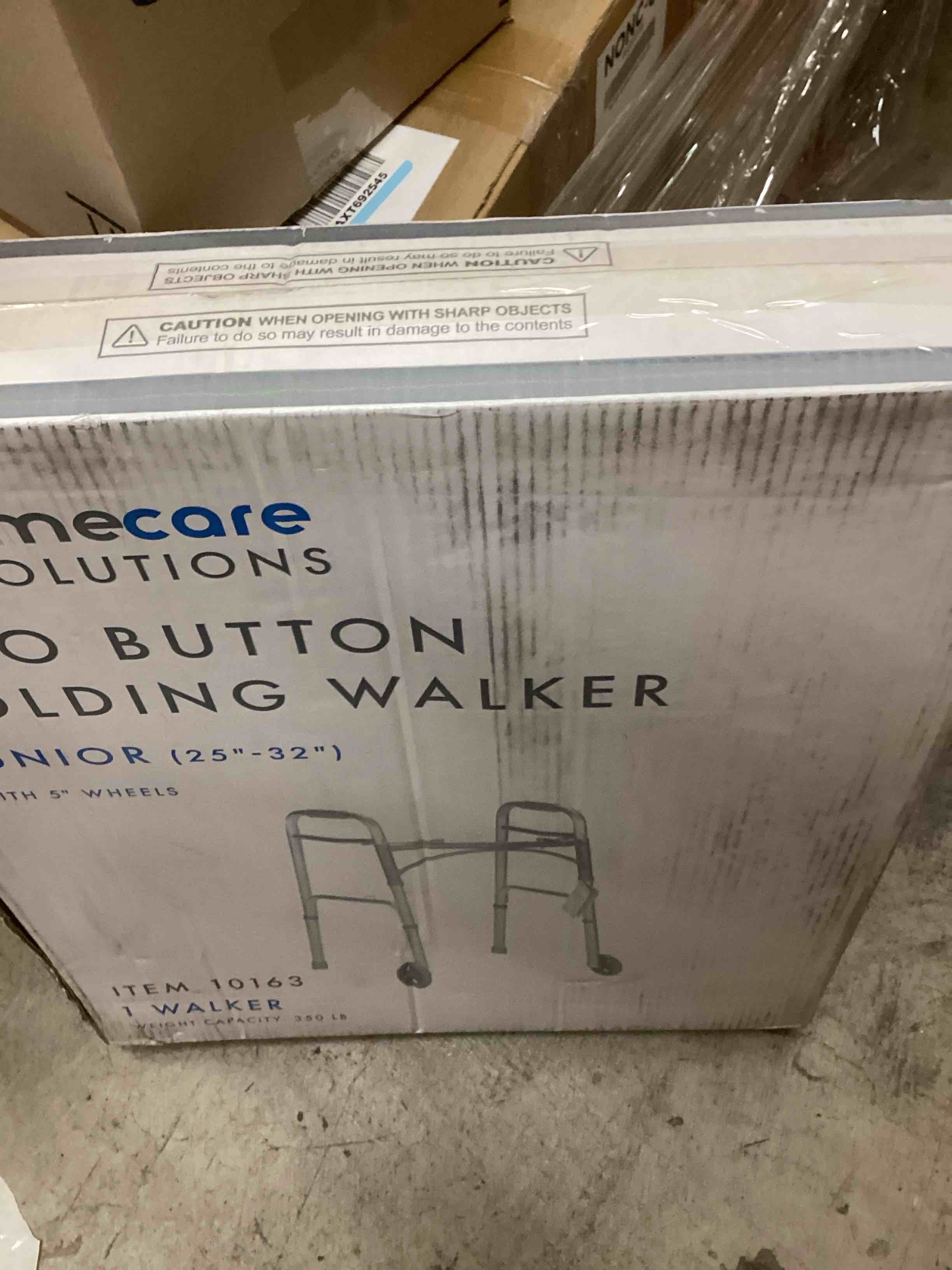 Condition photo showing New/Like New for dmecare solutions two button folding walker 