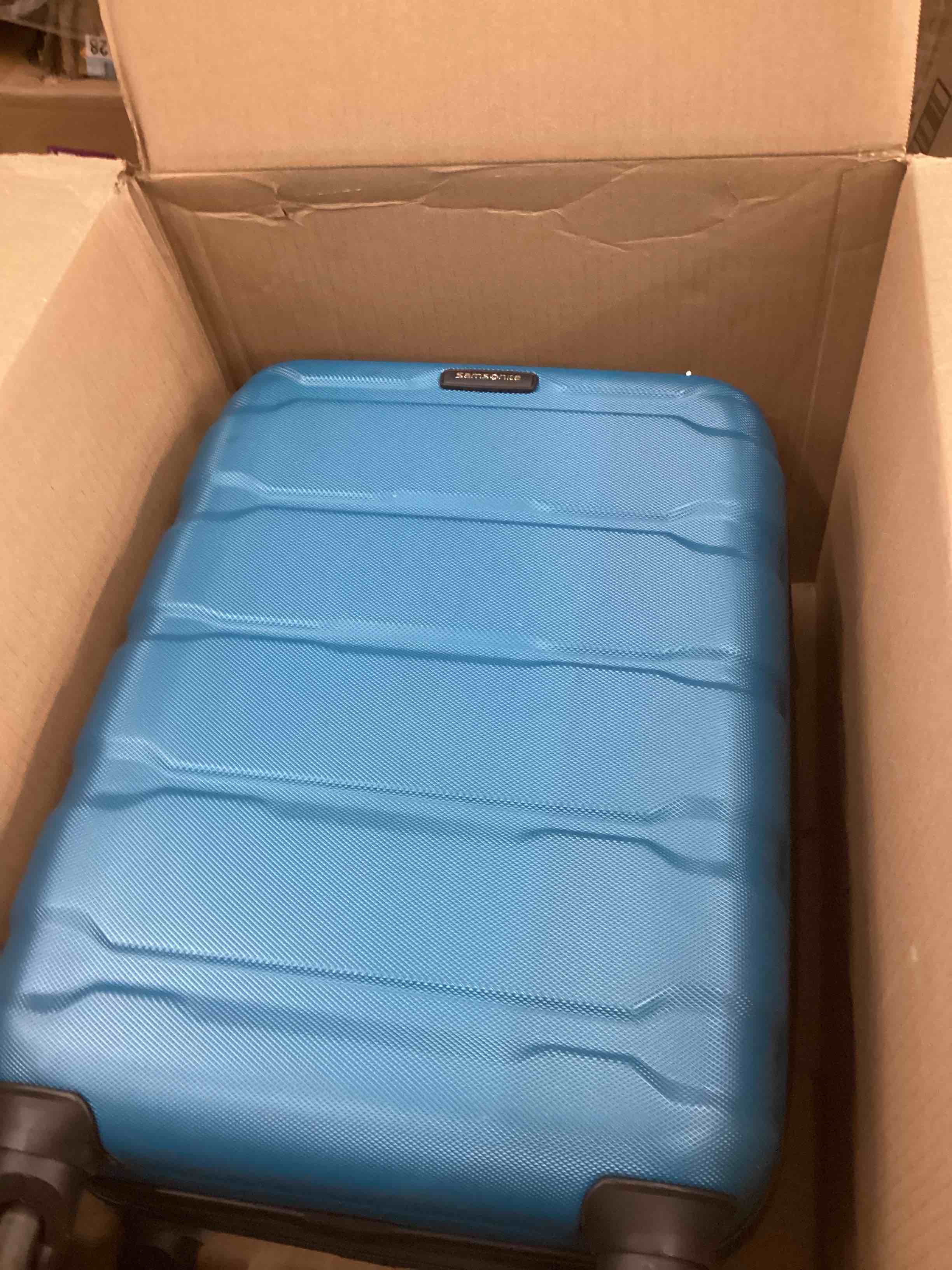 Condition photo showing As Is for Samsonite Omni PC Hardside Expandable Luggage with Spinner Wheels, Caribbean Blue, Carry-On 20-Inch