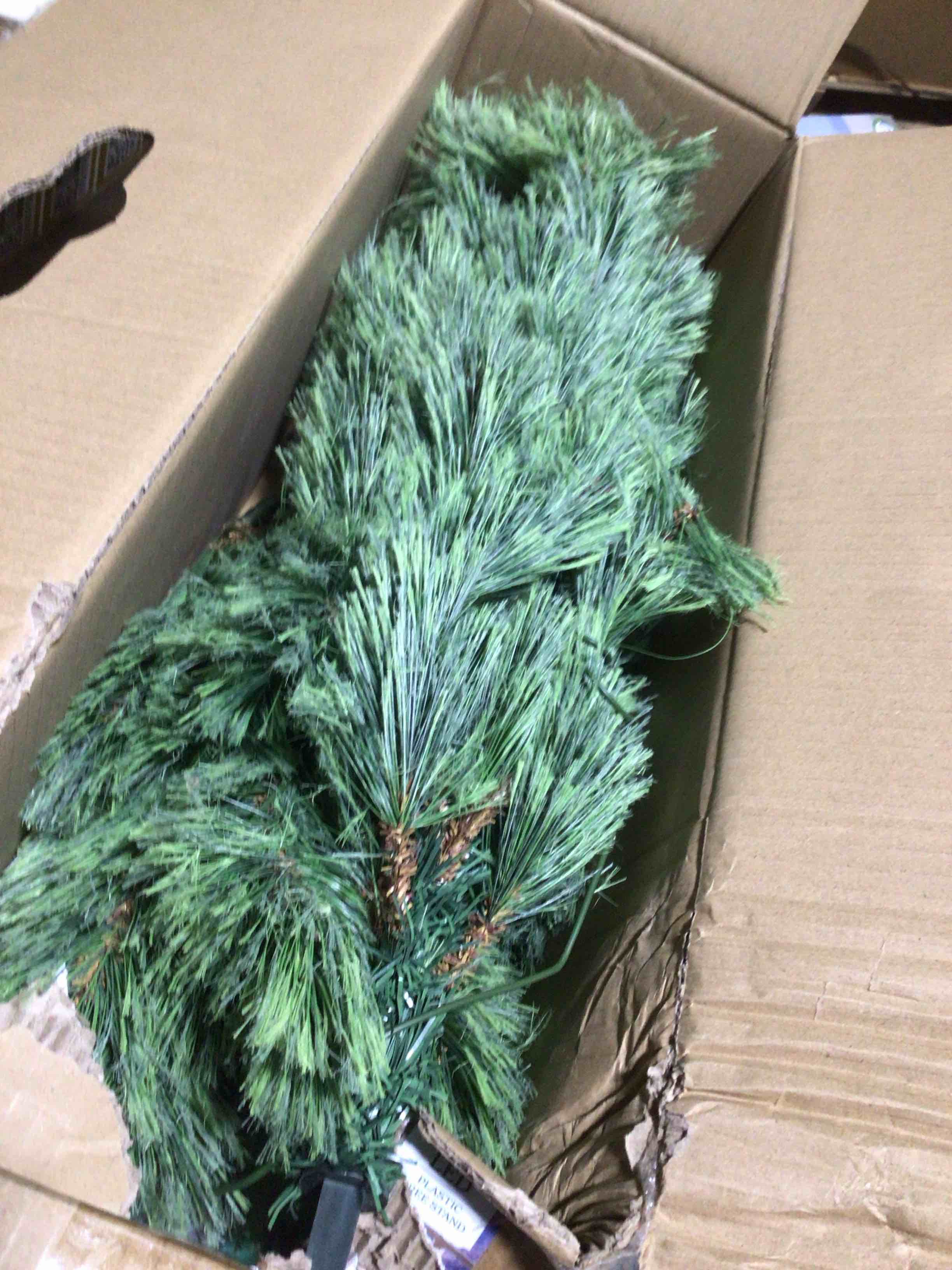 Condition photo showing As Is for 4 foot pre lit Canadian cashmere tree