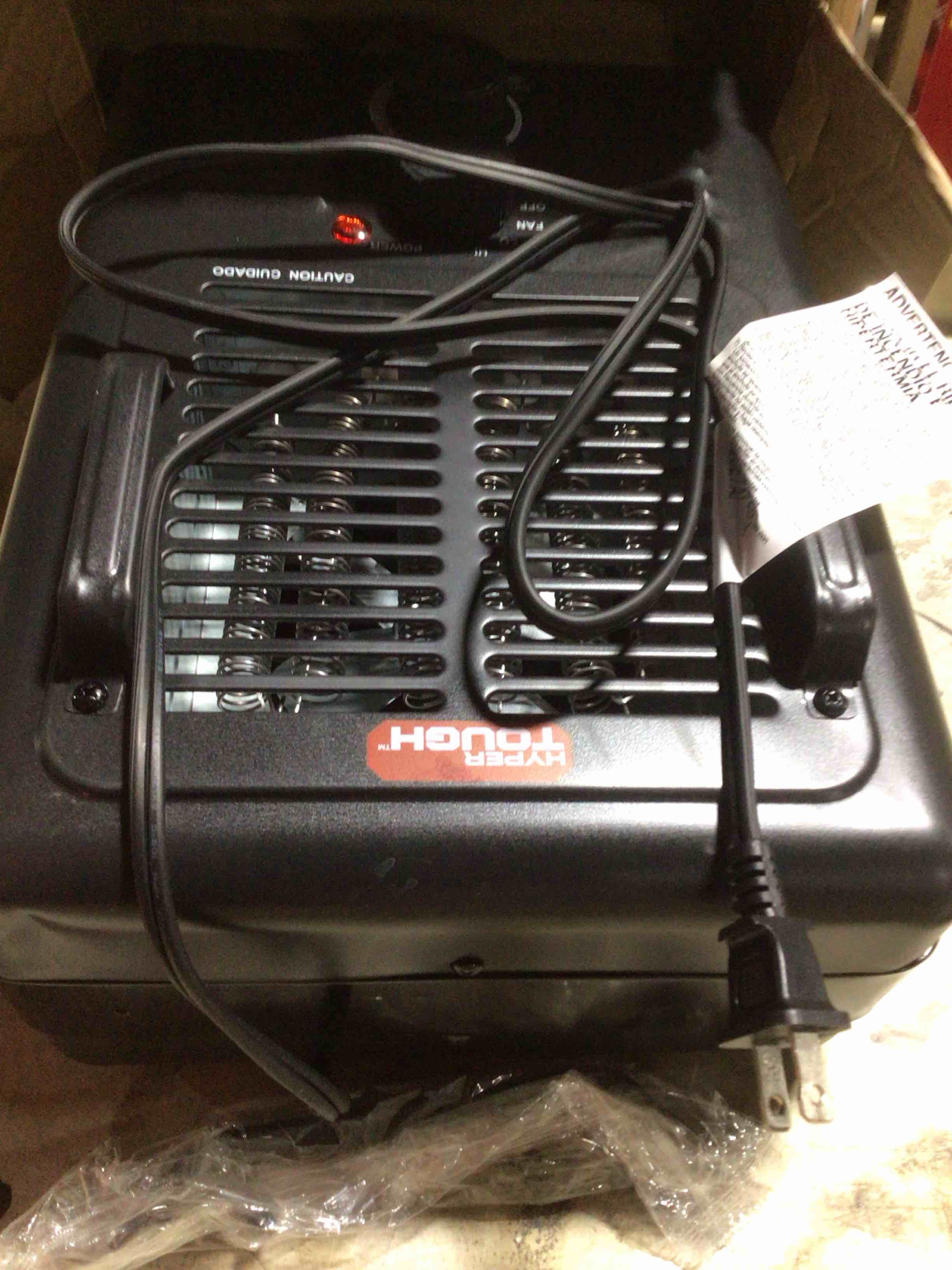 Condition photo showing As Is for Hyper Tough New 1500W Milkhouse Utility Heater