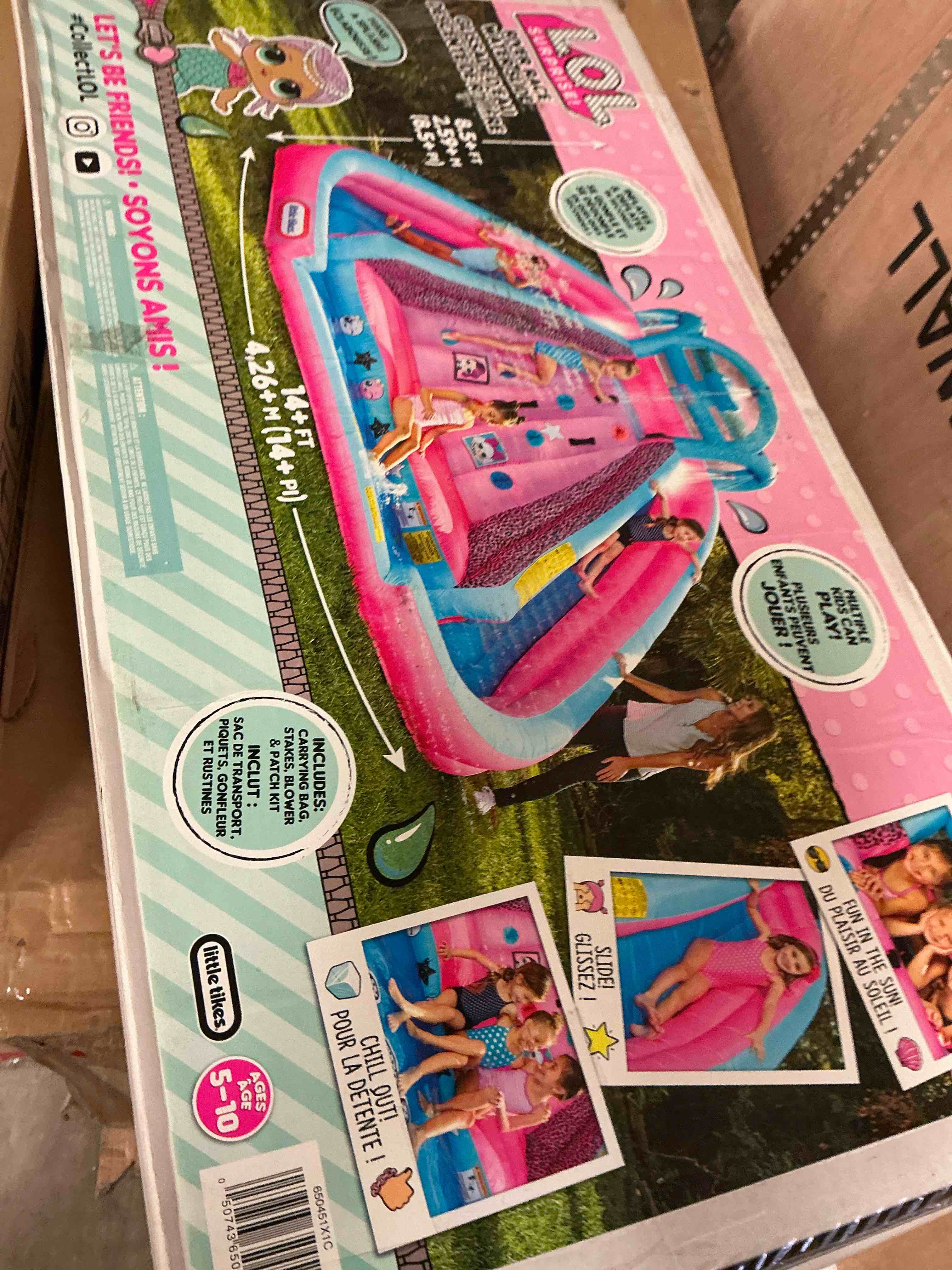 Condition photo showing New/Like New for lol surprise pink river race inflatable water park 2 slides climbing wall & blower outdoor toy ages 4 and up