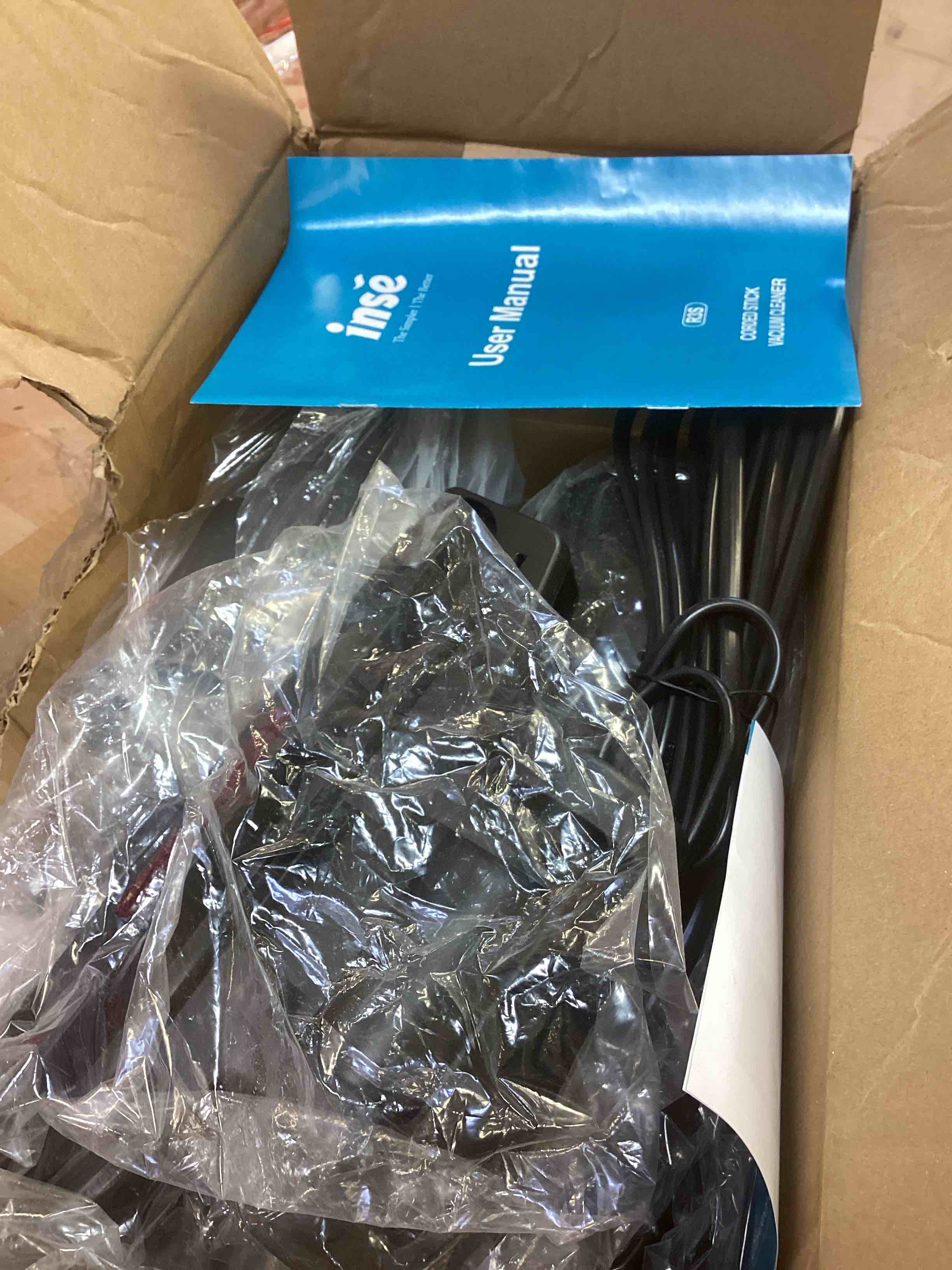 Condition photo showing As Is for inse corded stick vacuum cleaner