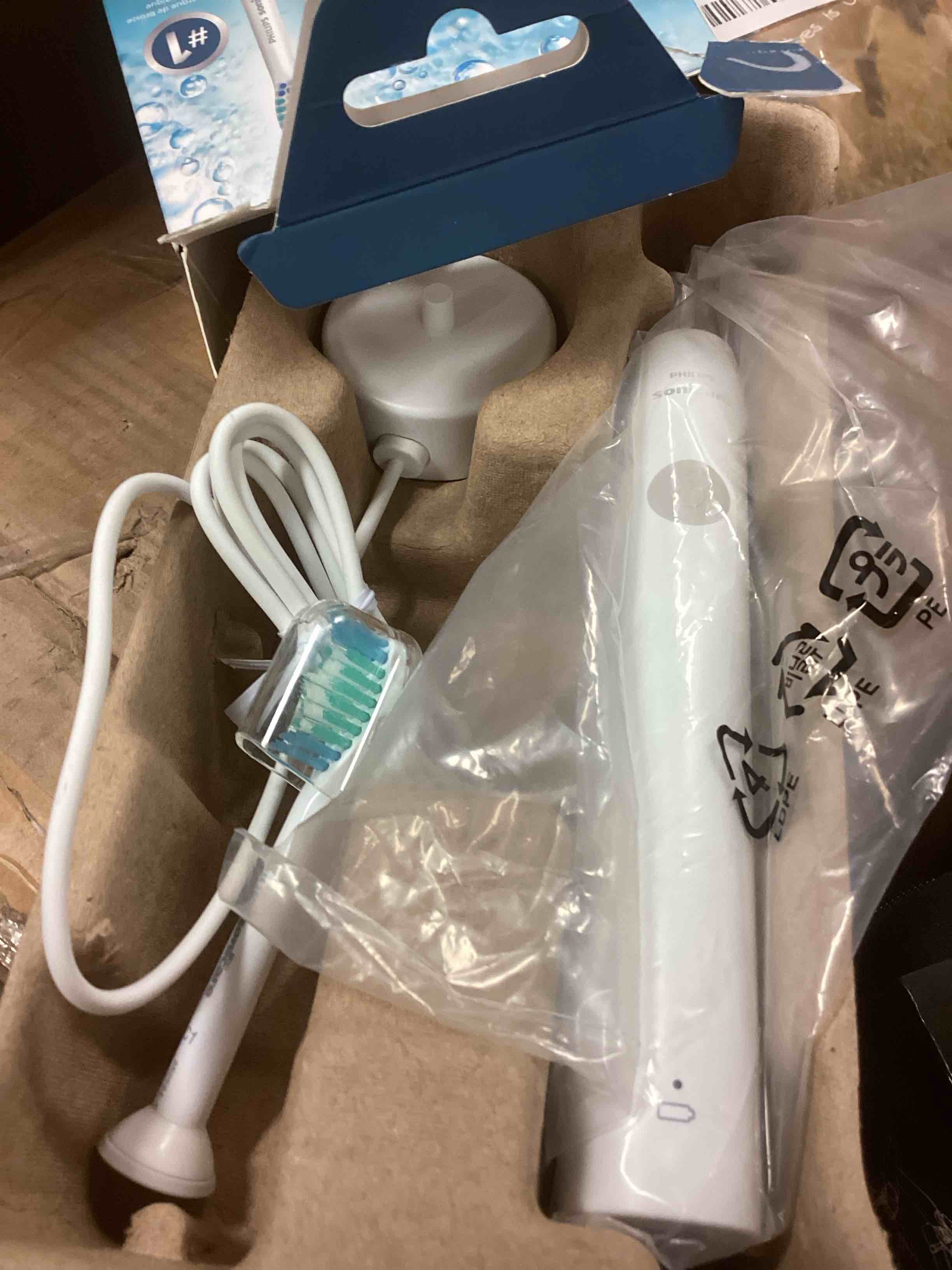 Condition photo showing New/Like New for philips sonicare 1100 series electric toothbrush - sonic toothbrush with advanced sonic technology, easystart, smartimer & quadpacer, white, model hx3641/02