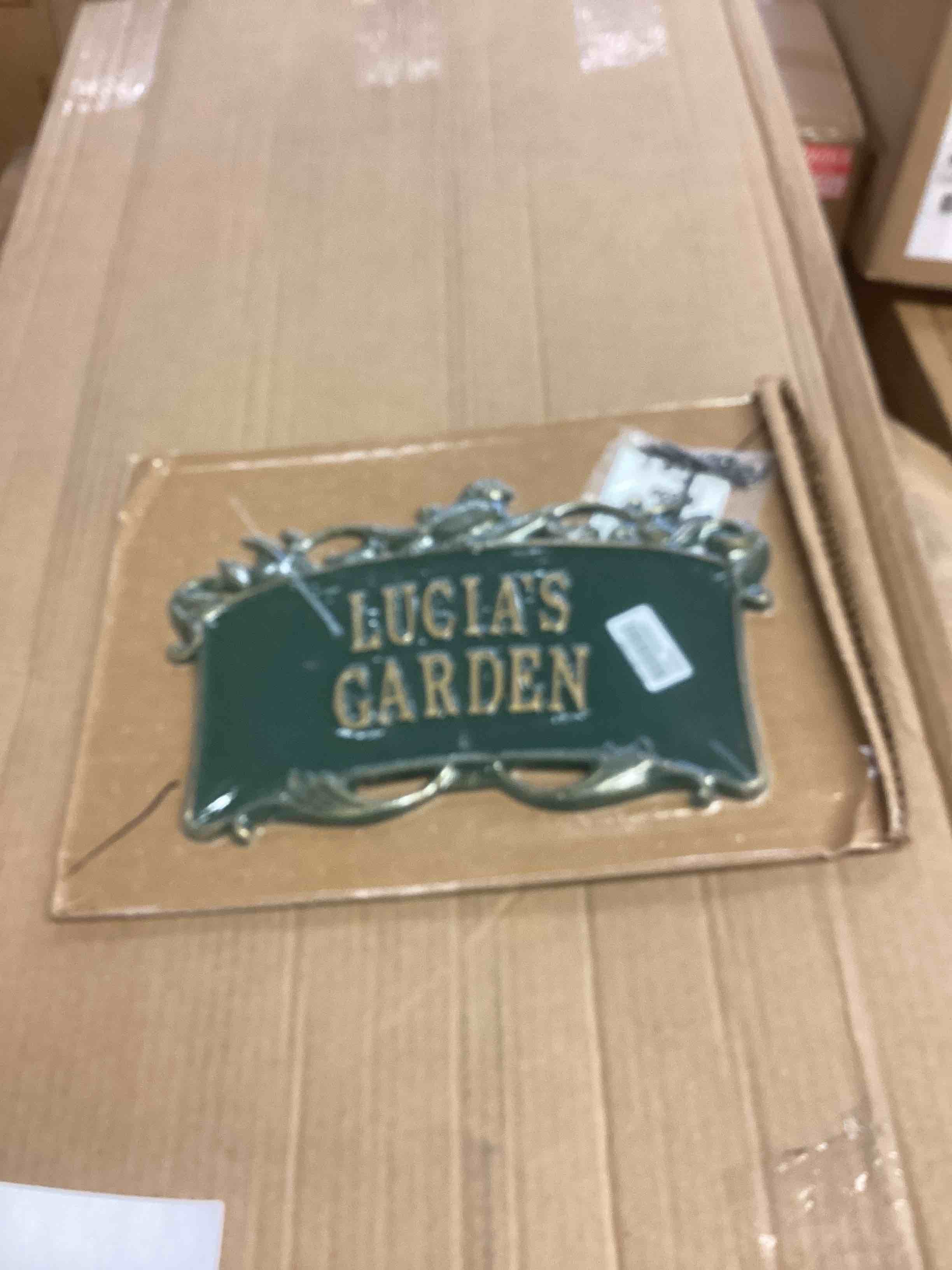 Condition photo showing New/Like New for metal sign lucia's garden