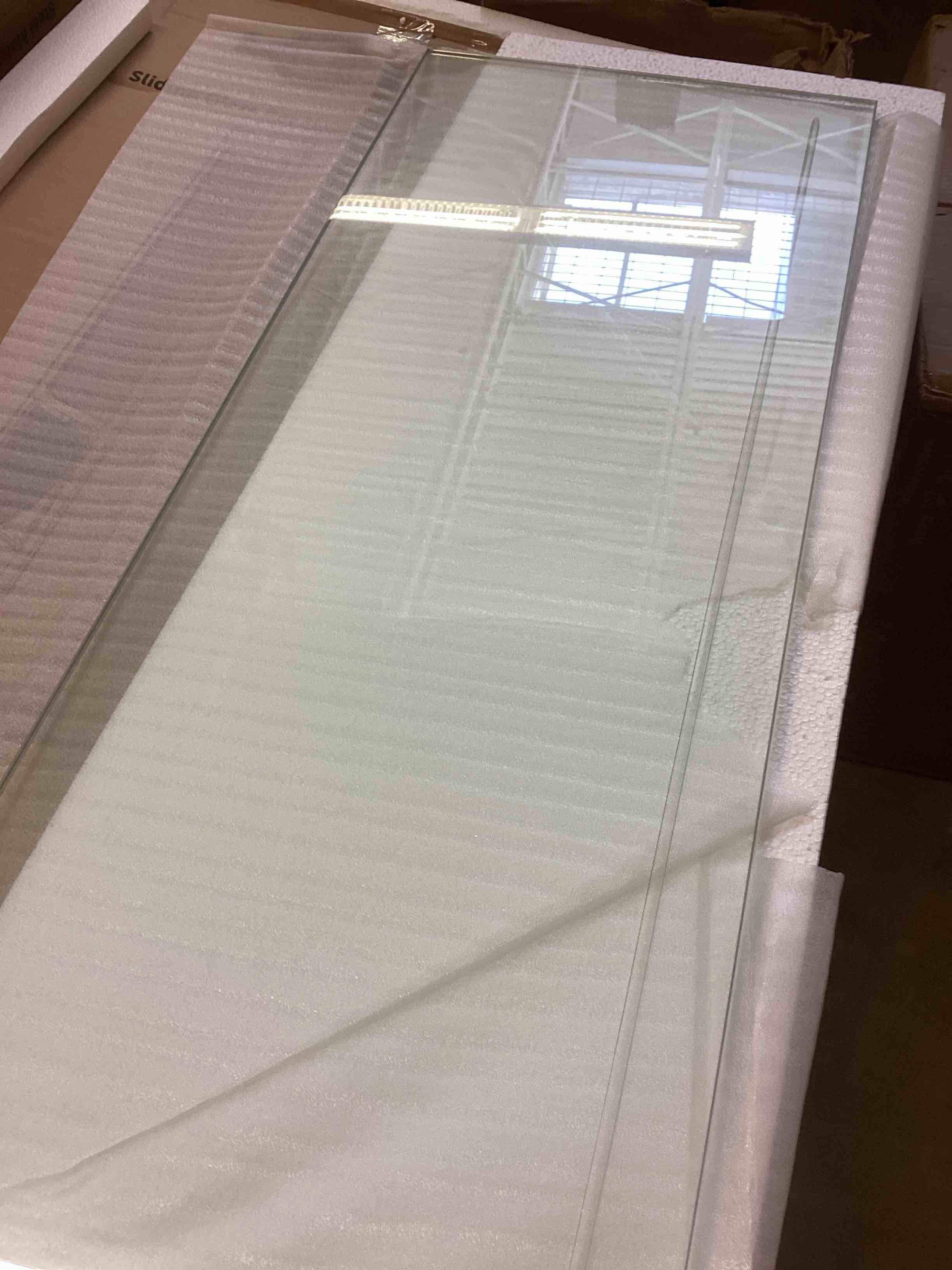 Condition photo showing New/Like New for tempered glass 14” x 39”