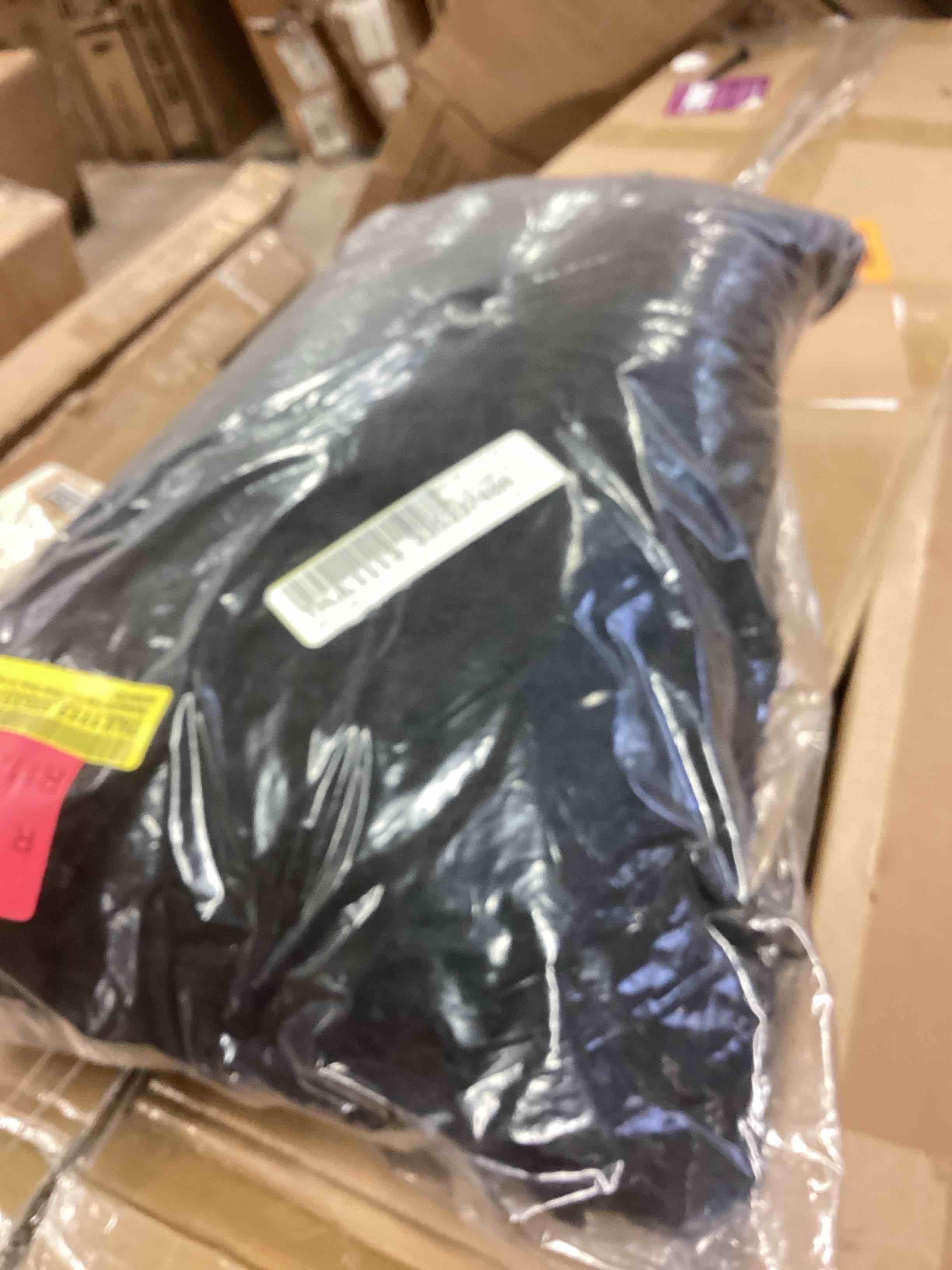 Condition photo showing New/Like New for rectangular faux fur pillow cover & insert color black