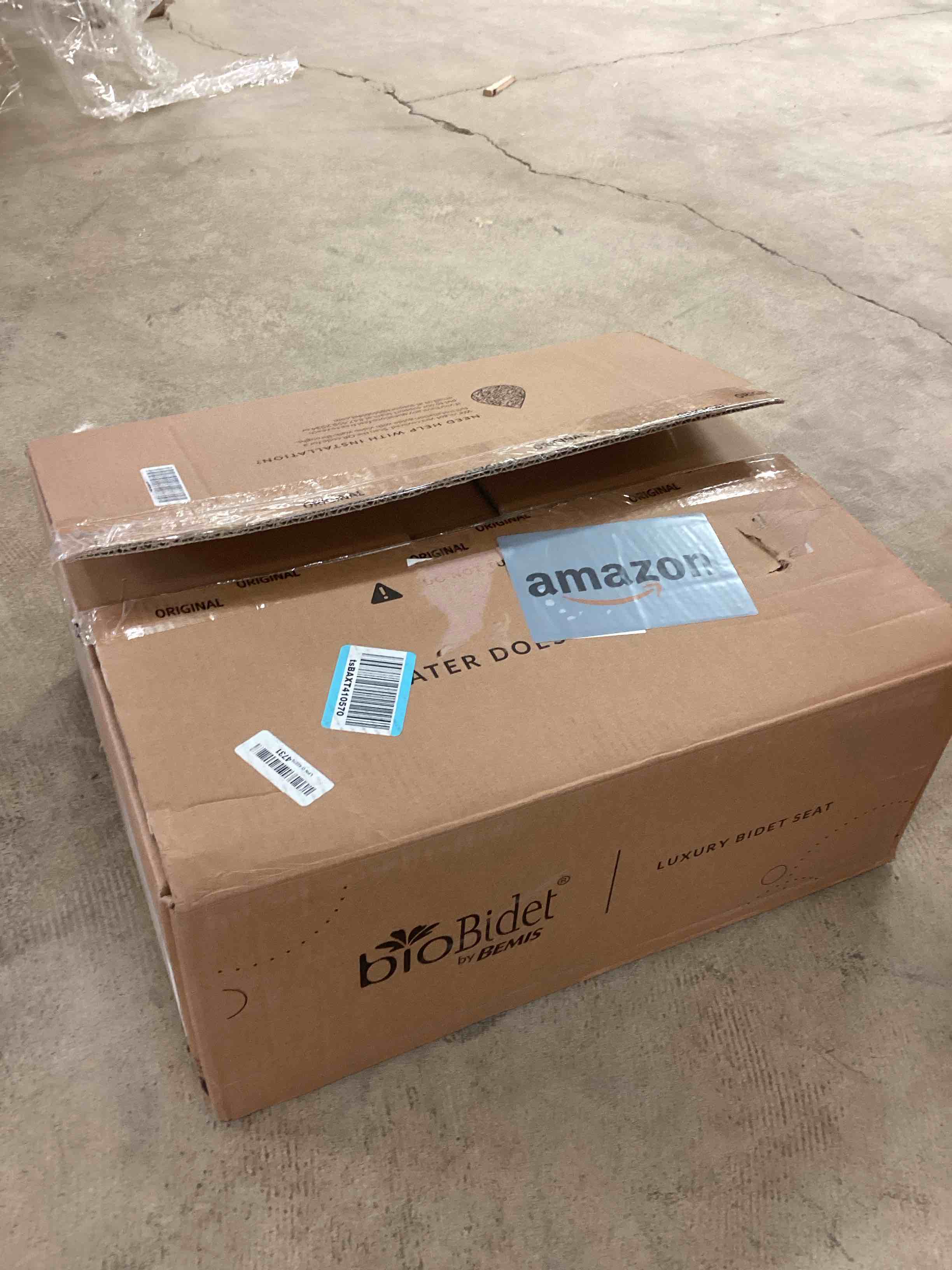 Condition photo showing New/Like New for Bio Bidet BB1000 Warm Water Bidet Seat, Air Dryer, Heated Seat with Slow Close Lid, Remote Control, Elongated Premium Elongated