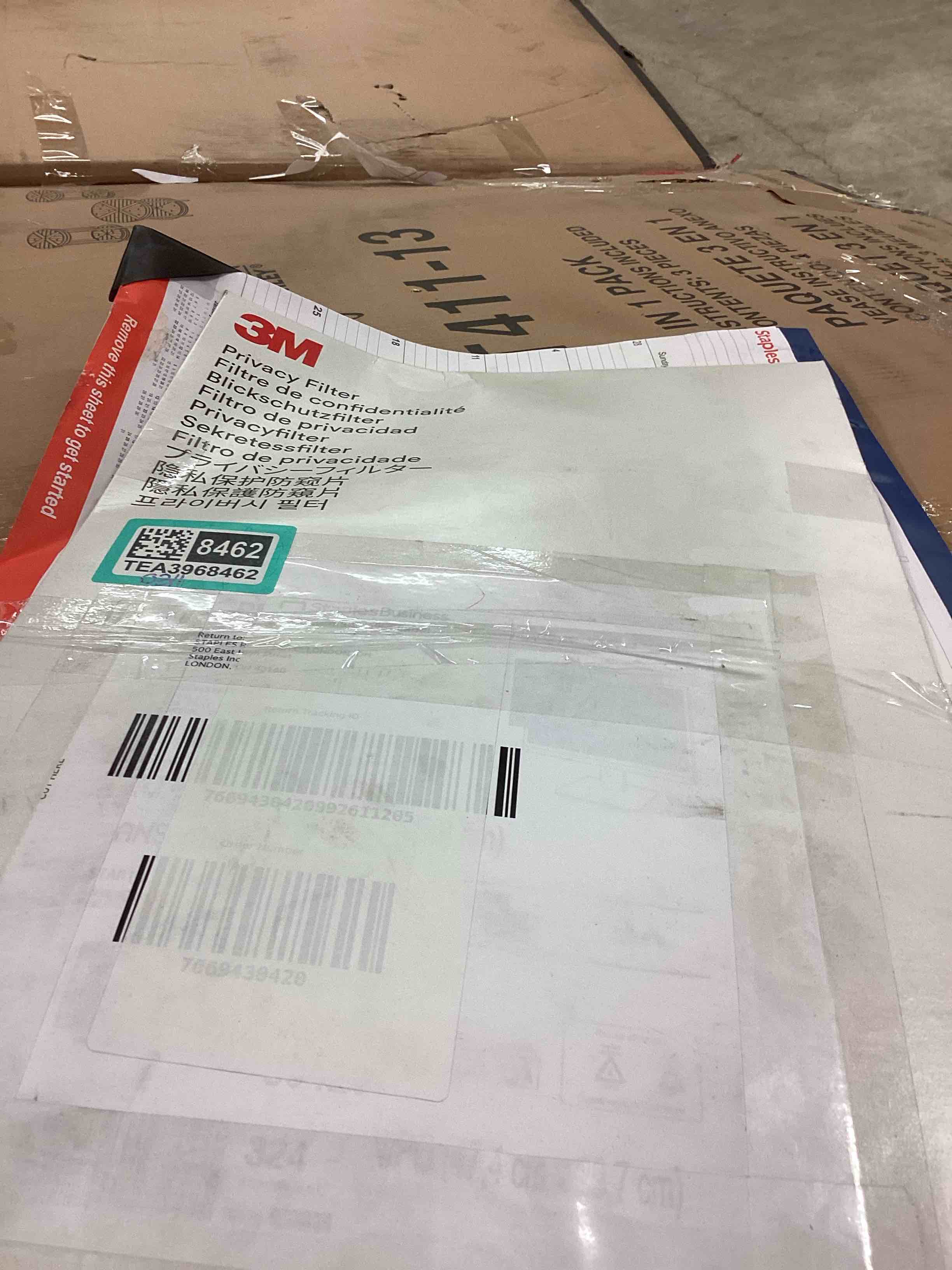 Condition photo showing New/Like New for STAPLES calendar 2026 + privacy filter bundle