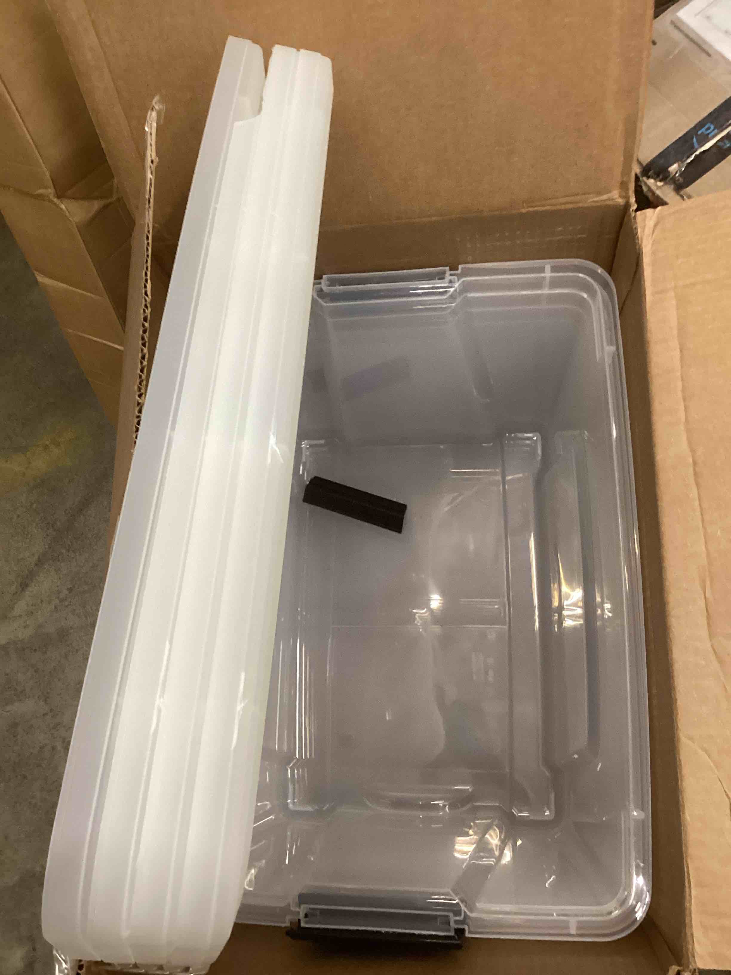 Condition photo showing Good Condition for IRIS USA 51 L (54 QT) Plastic Storage Box with Lid and Latches - 4 Pack - BPA-Free, See-Through Organizing Solution, Durable Nestable Stackable Containers, Secure Pull Handle - Clear Clear 54 Qt 4 Pack