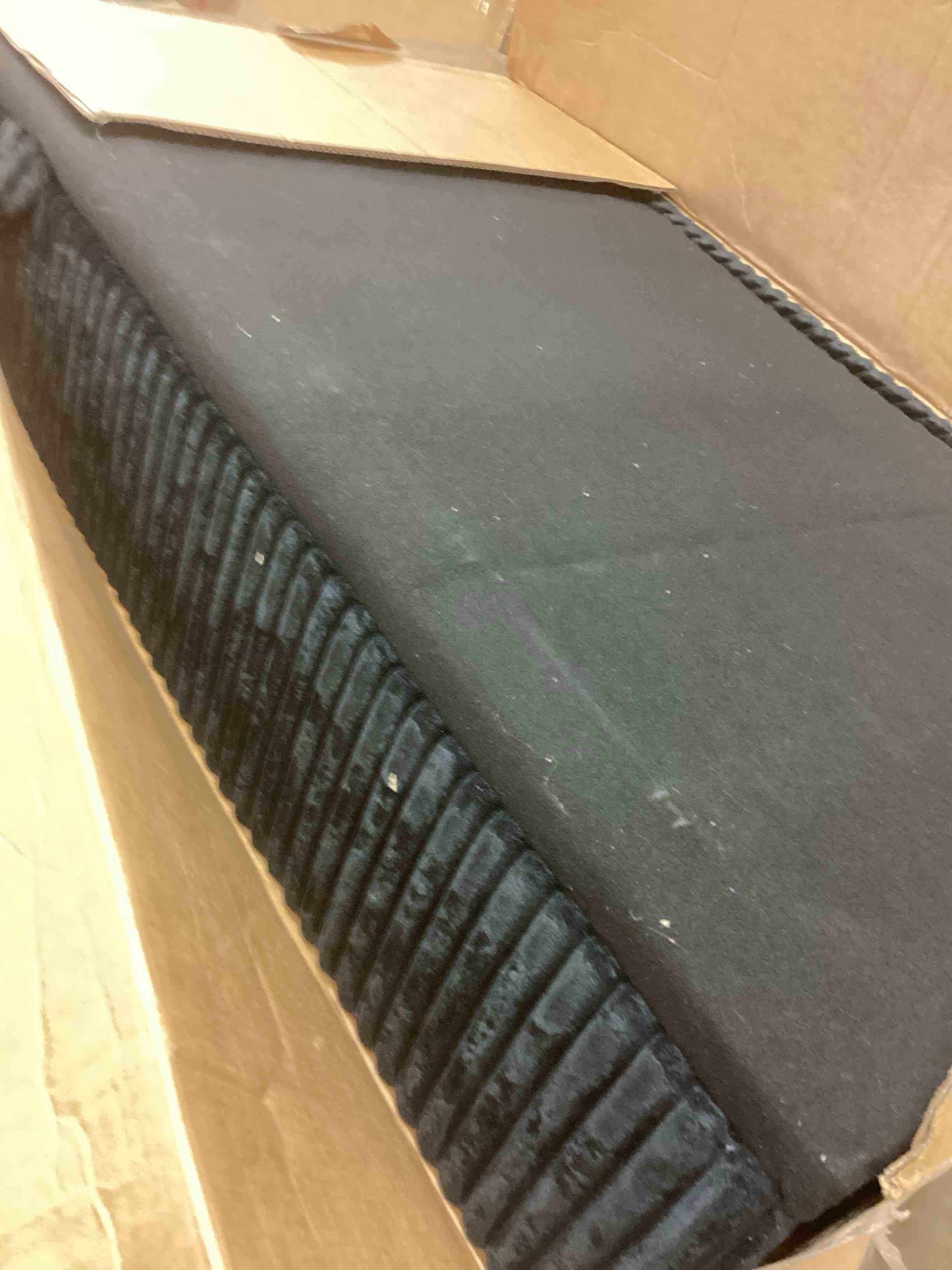 Condition photo showing As Is for Oversized 110.6" U-Shaped Corduroy Sleeper Sectional Sofa with Pull-Out Bed and Storage Chaise ( incomplete one box only)