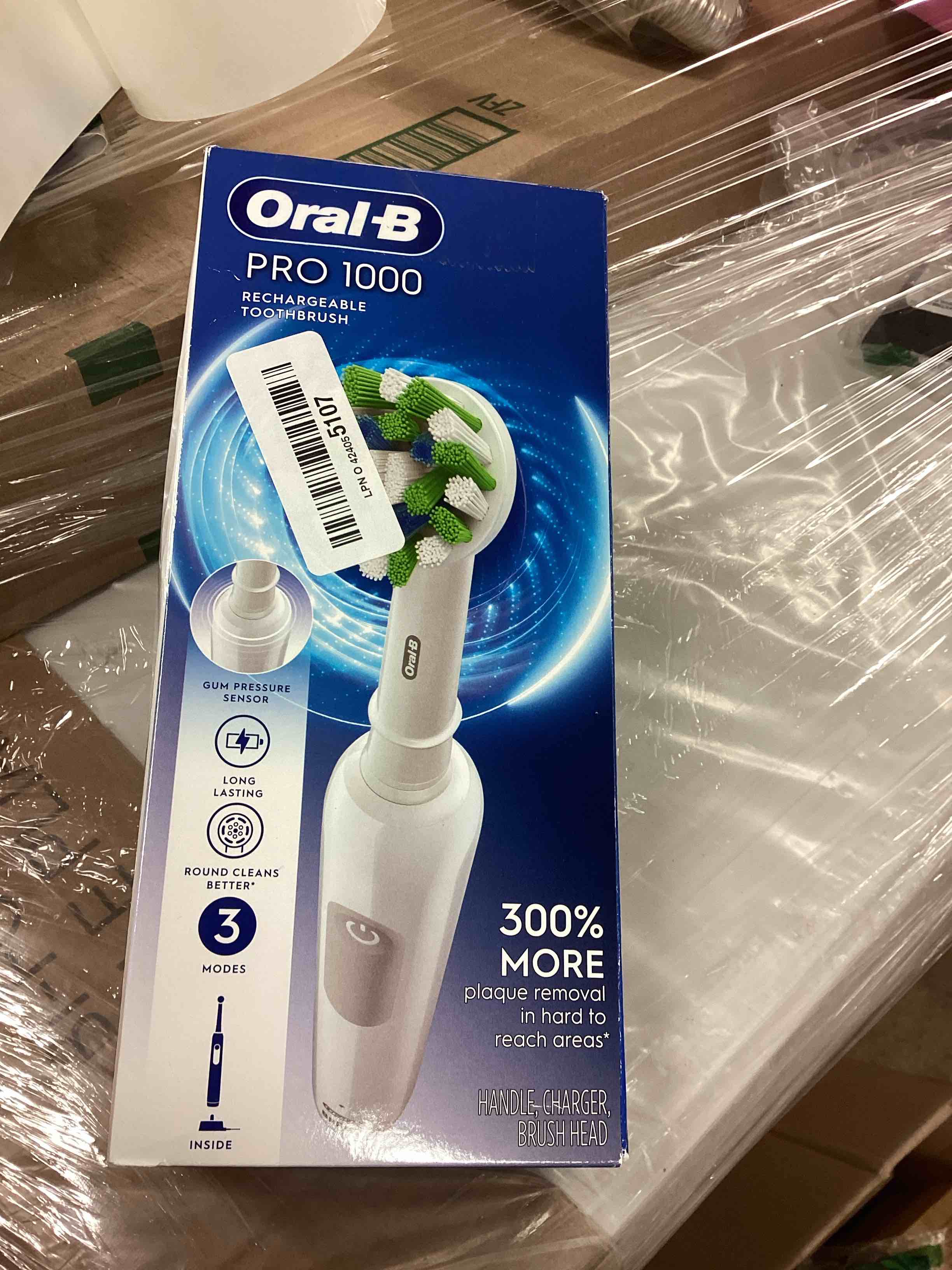 Condition photo showing New/Like New for Oral-B Pro 1000 Rechargeable Electric Toothbrush, White