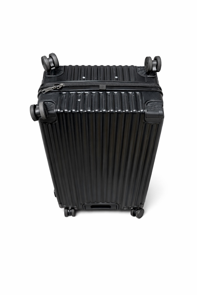 Condition photo showing As Is for wheeled suitcase wanderlust 