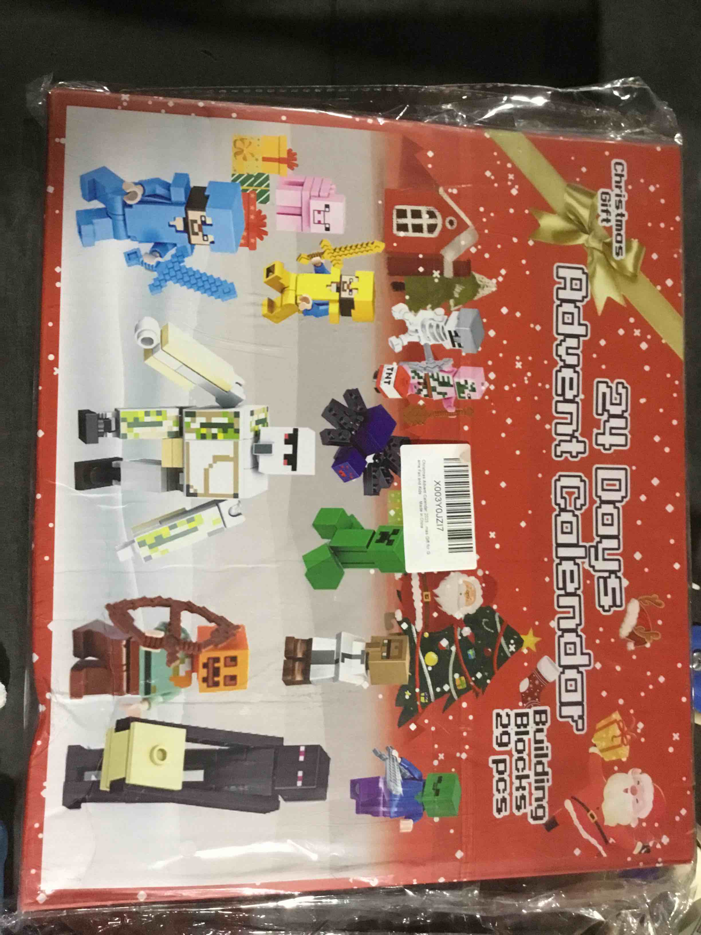 Condition photo showing New/Like New for christmas advent calendar 2023 days surprise countdown calendar, toy figures, building blocks including 24 characters, christmas holidays for kids and girls