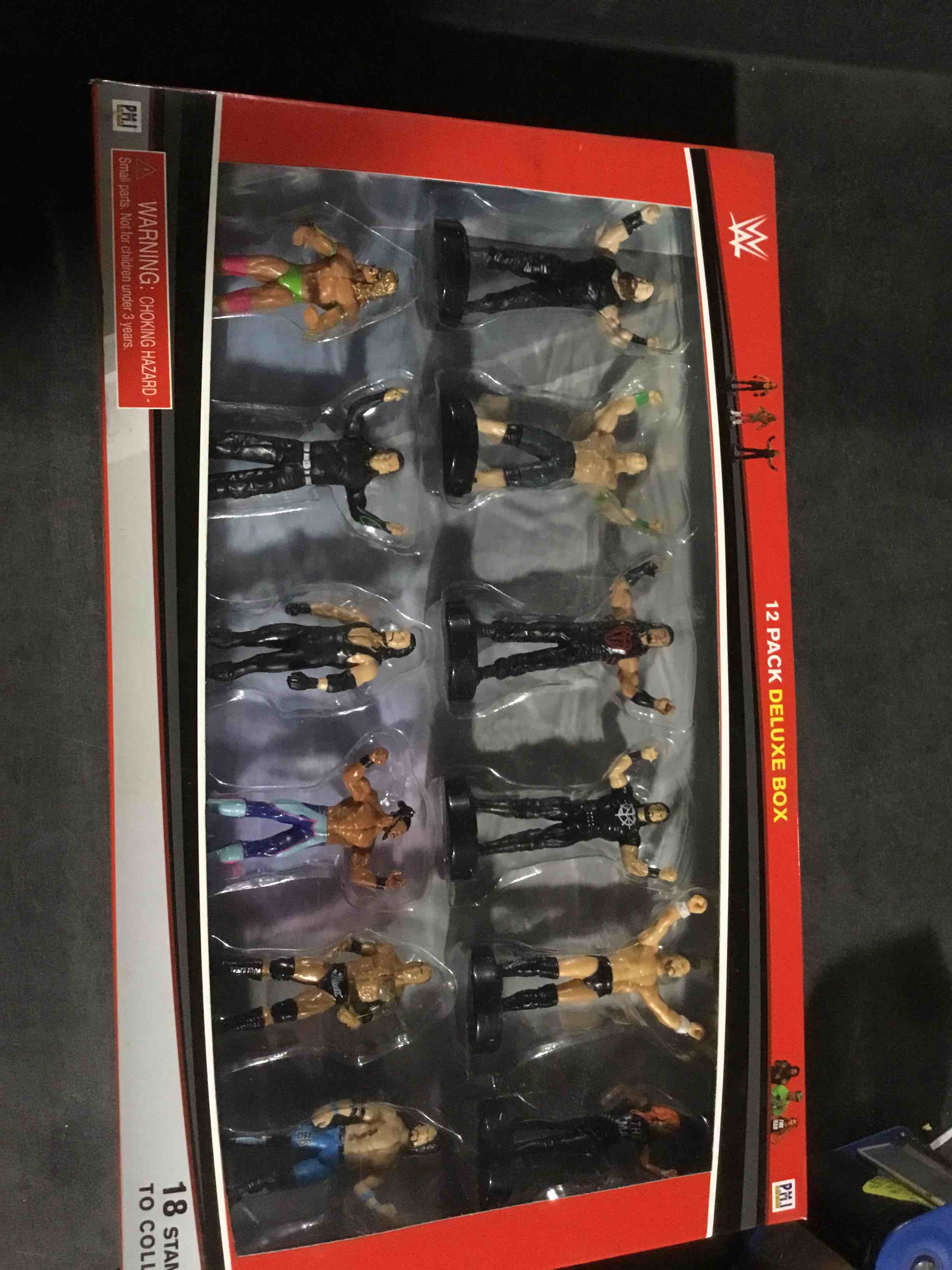 Condition photo showing New/Like New for 2020 wwe 12 pack deluxe box stampers ultimate warrior and more new in box
