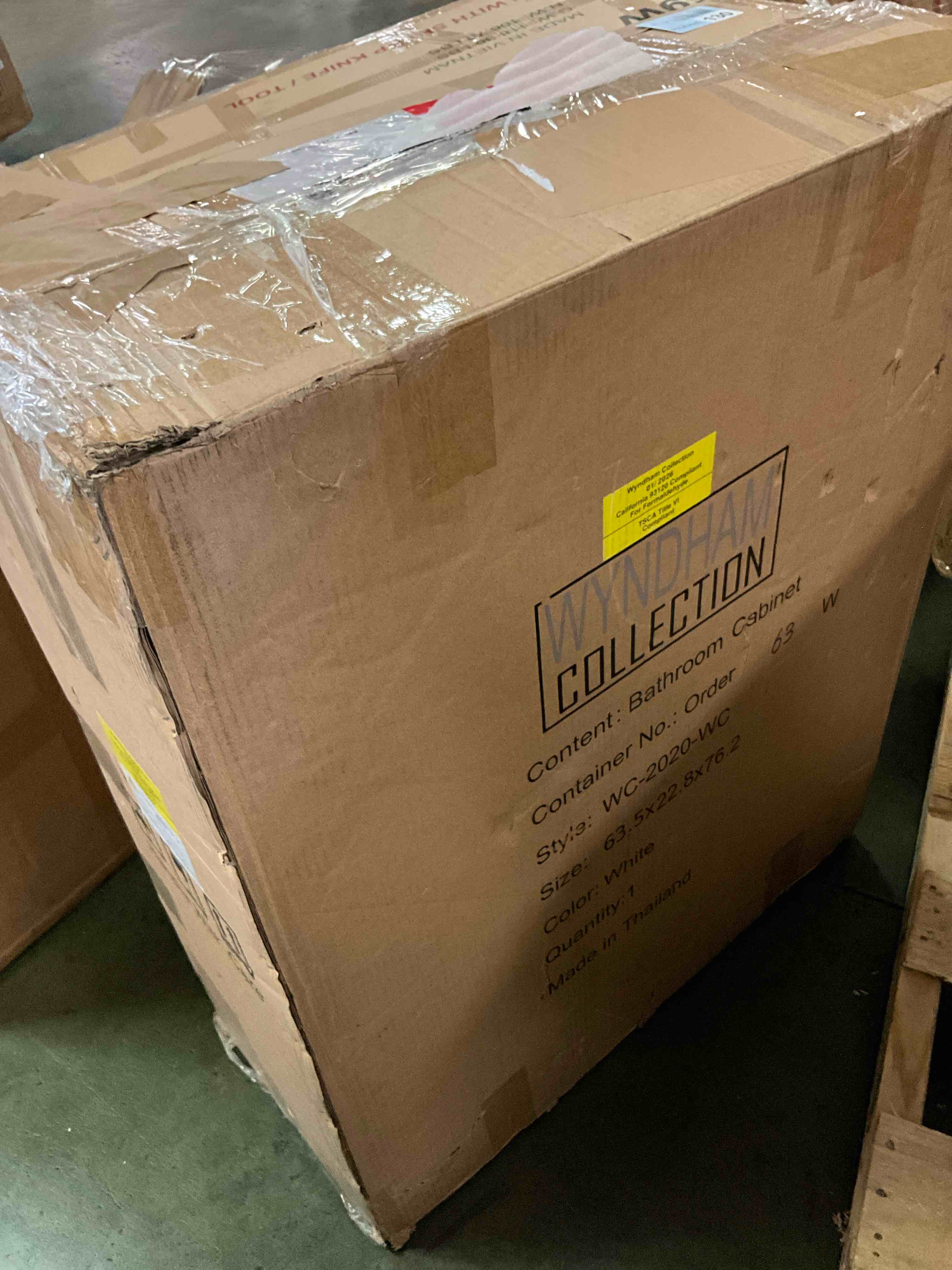 Condition photo showing New/Like New for wyndham collection bathroom cabinet 