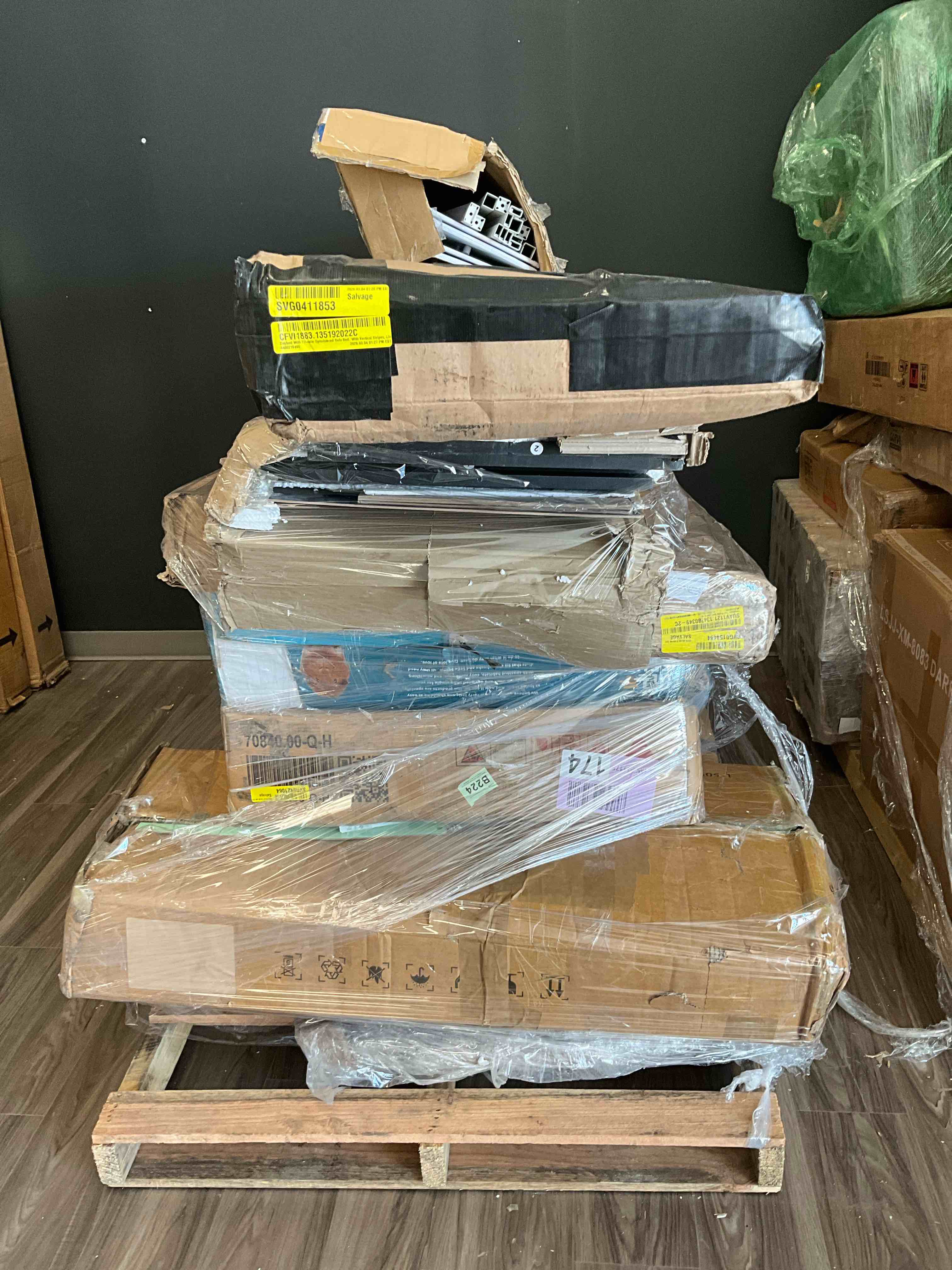 PALLET LOT OF ASSORTED INCOMPLETE FURNITURE 
