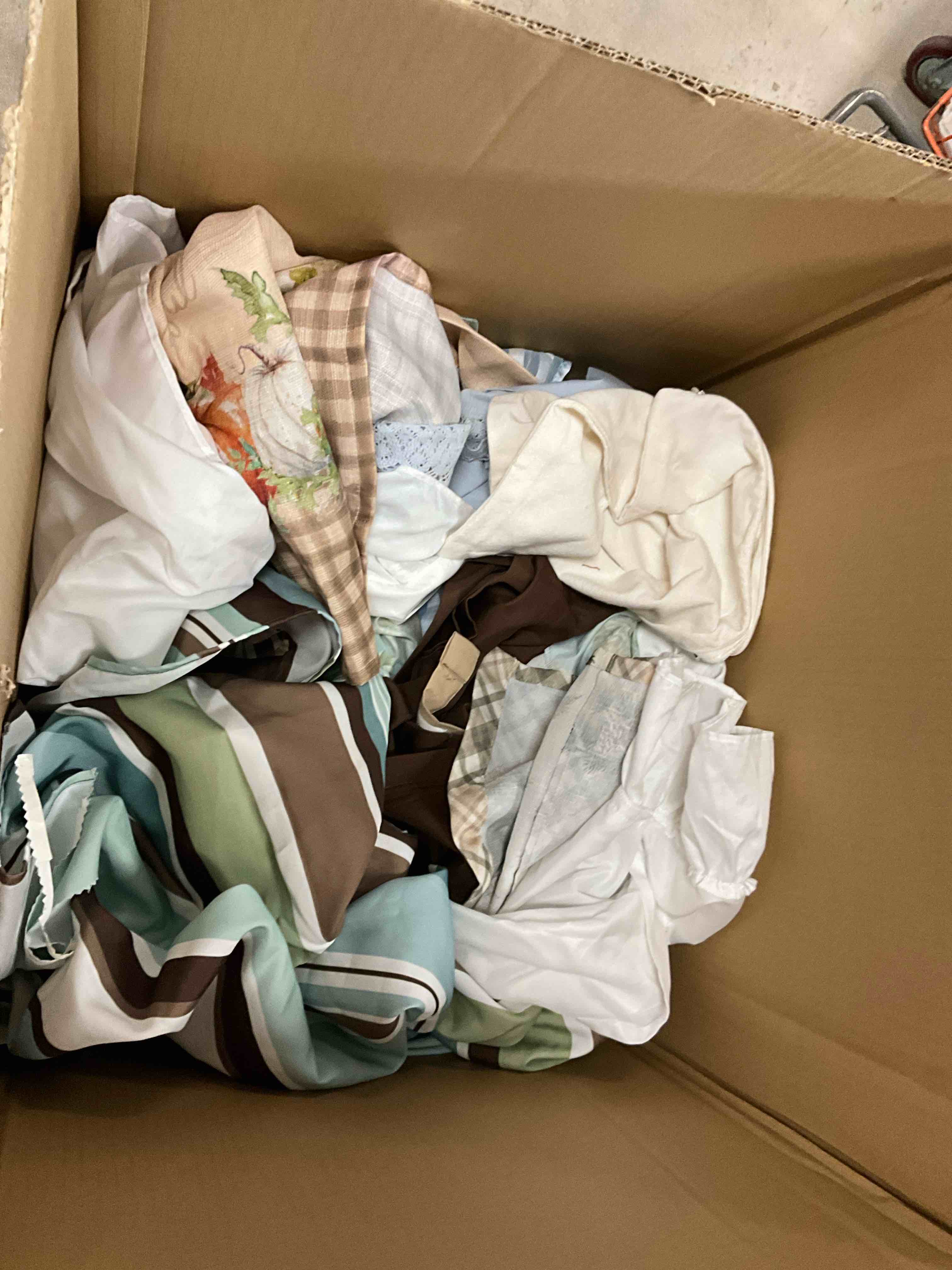 Box Full Of Assorted Curtain and Some Table Runners (1Bid)