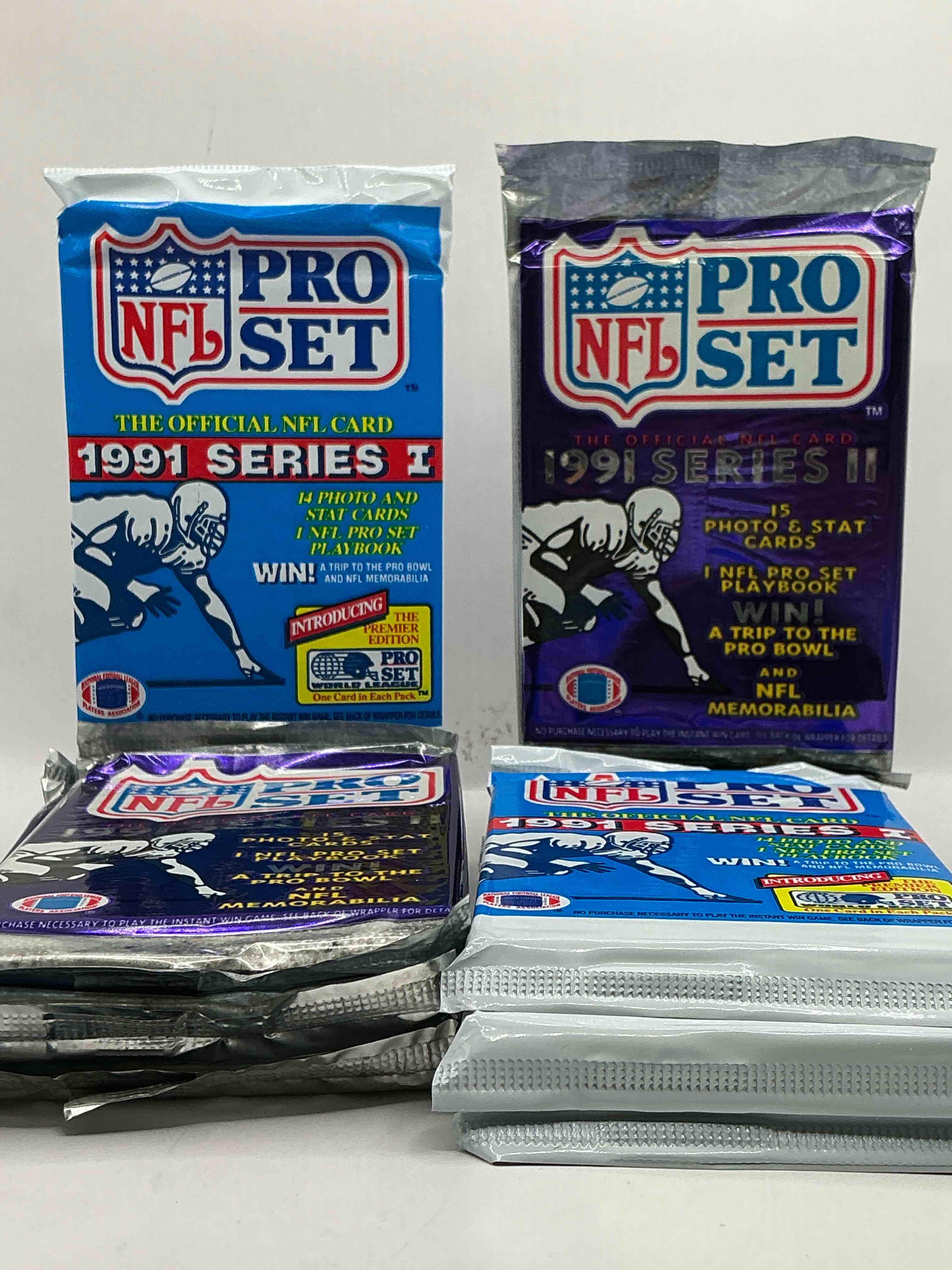 Condition photo showing New/Like New for Wow! 1991 Pro Set Football Sealed Card Packs Series I, Direct From Original Retail Case!Highly Sought After By Collectors As This Year Is Loaded With High Profile Cards!Search For Cards From Barry Sanders, Deion Sanders, Troy Aikman, Michael Irvin & Much More! Getting Hard To Find!