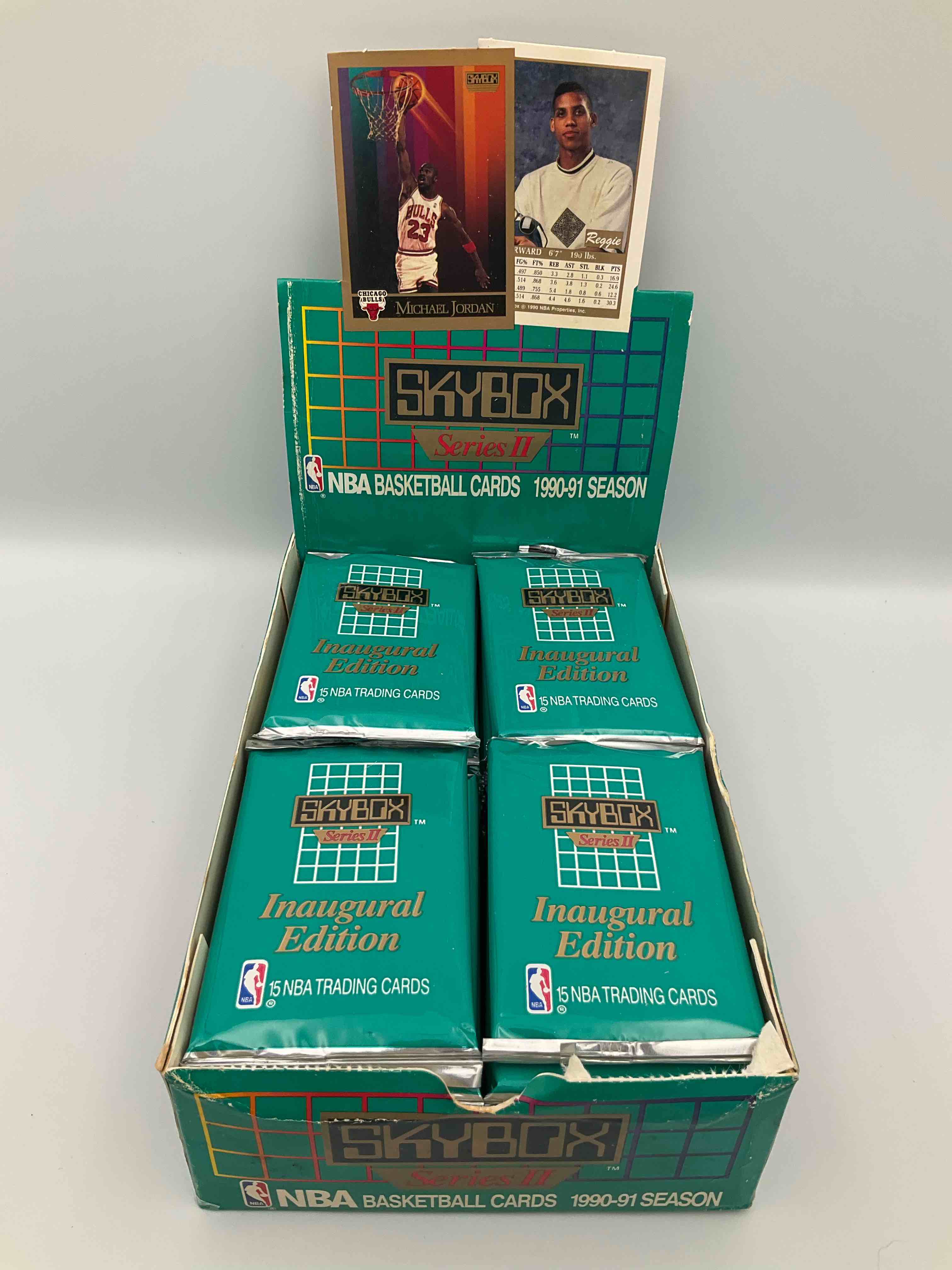 Condition photo showing New/Like New for Michael Jordan, Magic Johnson & More! Search For So Many NBA Legends & Stars! 1990-91 Skybox Unopened Pocks! Direct From Original Box! These Packs Are Sought After For Ther Eye-Catching Teal Look & Awesome Cards! Search For Valuable Michael Jordan, Larry Bird & Magic Johnson Cards! Along With Other Stars!