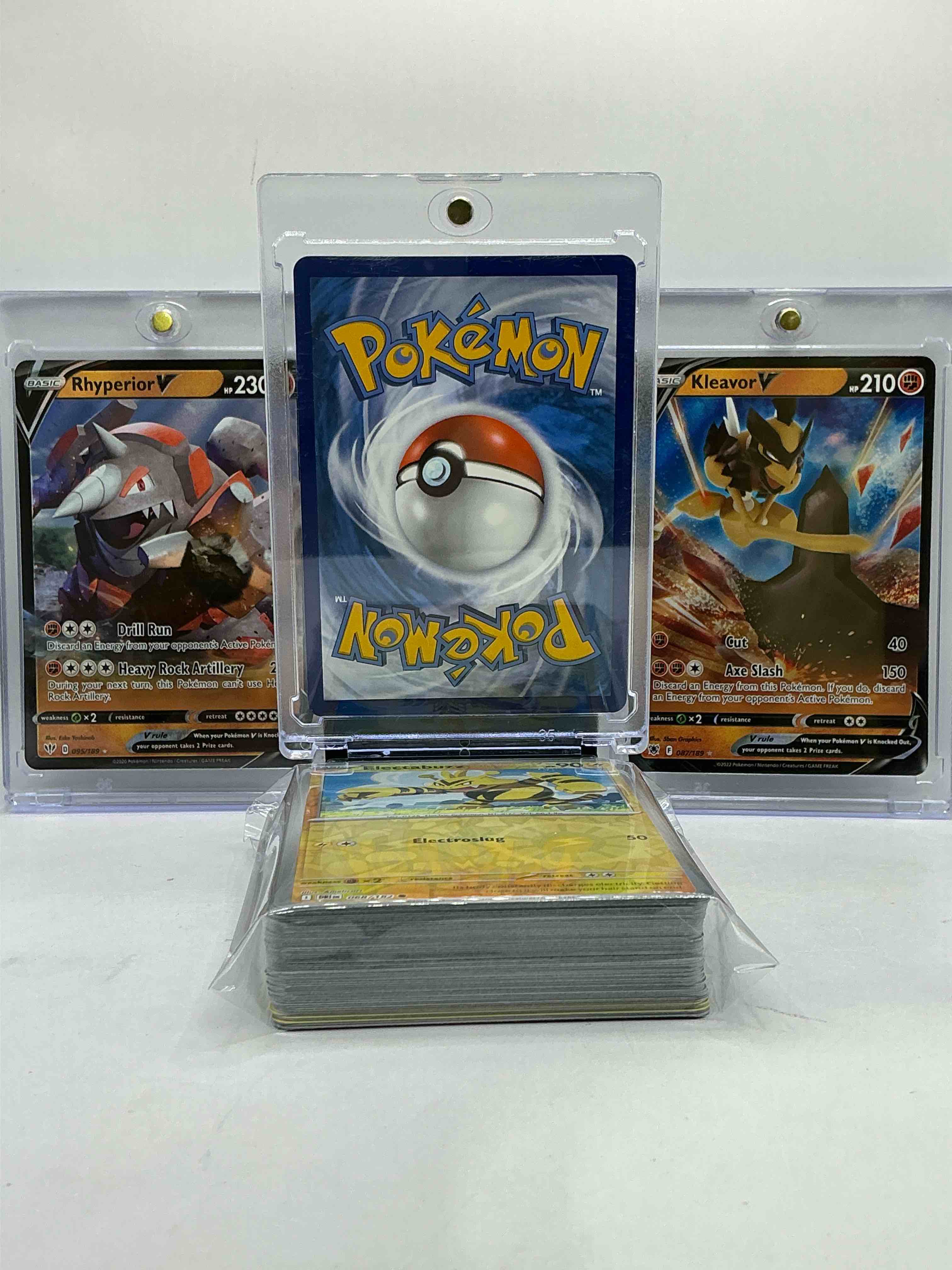 Condition photo showing New/Like New for Lucario V, Rhyperior V & Kleavor V Holo Match! WOW! Insane Trio! This 50 Card Lot Includes Commons, Legends, Heroes, Holos & More! 