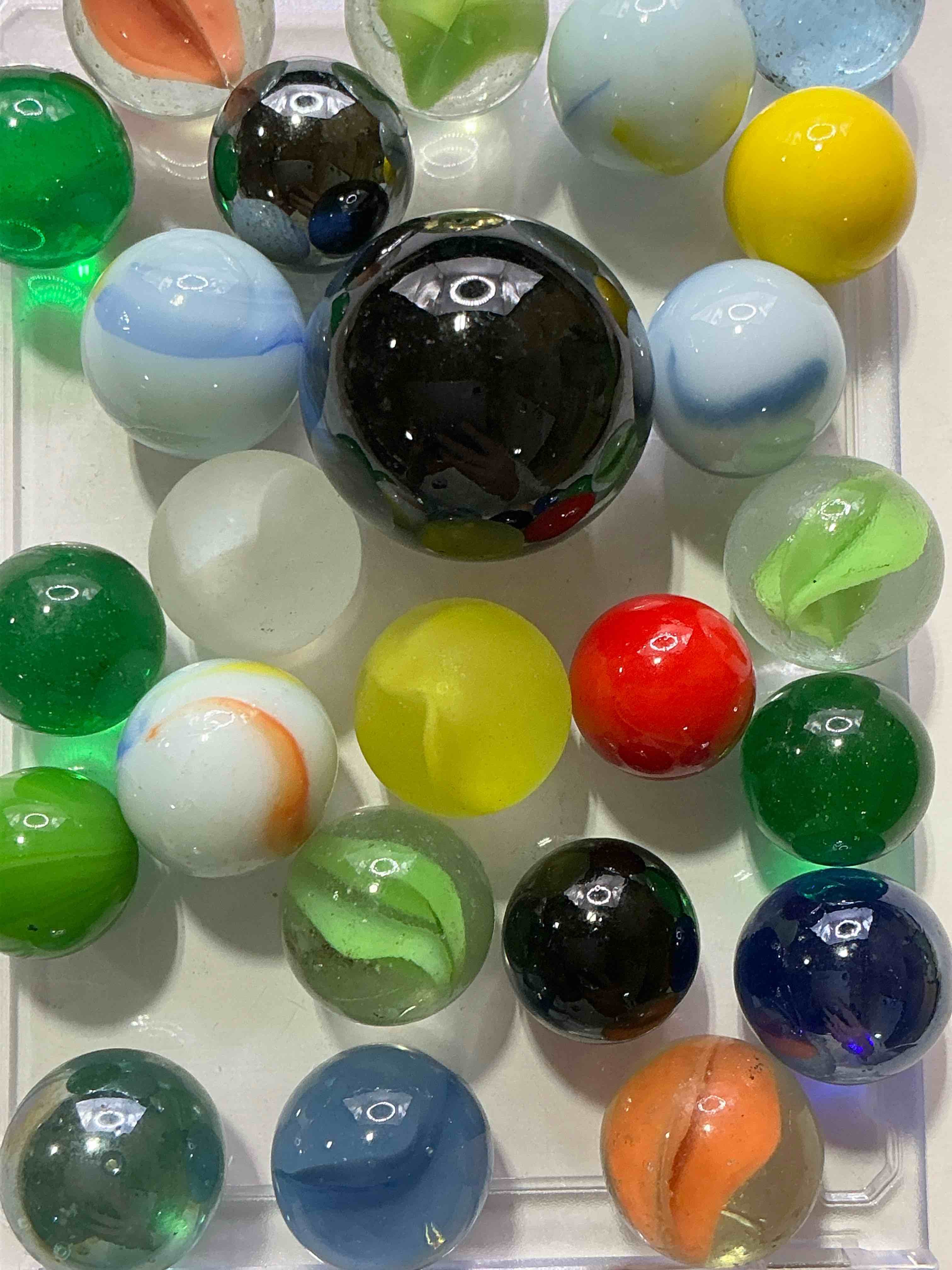 Condition photo showing New/Like New for Antique Glass Marbles! Genuine Stunning Marbles Lot, All Marbles Made Between The Years 1925-1965 & Made With Uranium! Many Are Great Depression Era & Even Earlier! Gorgeous, Authentic Pieces Of History!  