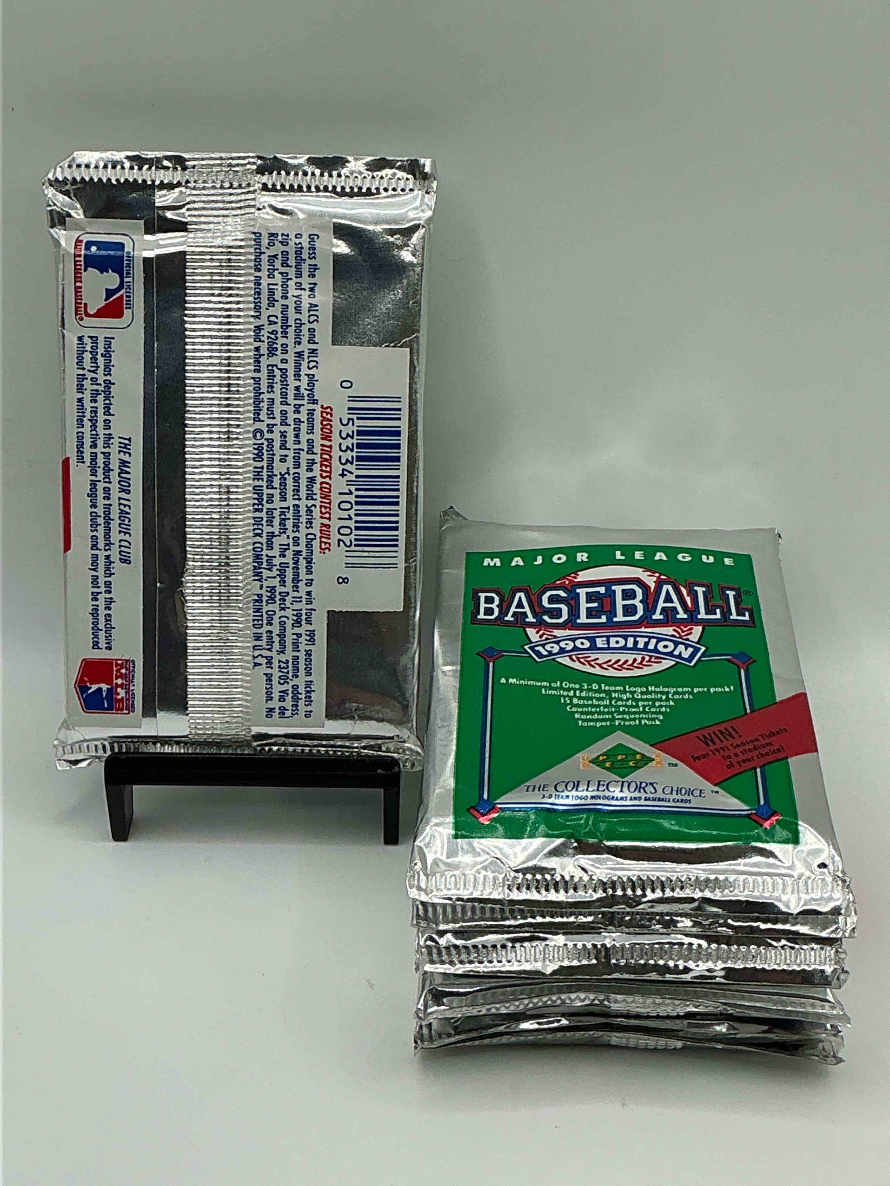 Condition photo showing New/Like New for 1990 Upper Deck Baseball Unopened Sports Trading Card Packs! Direct From Original Box! Look For Possible Collector's 3D Team Logo Card! As Well As Early Ken Griffey Jr. Cards!